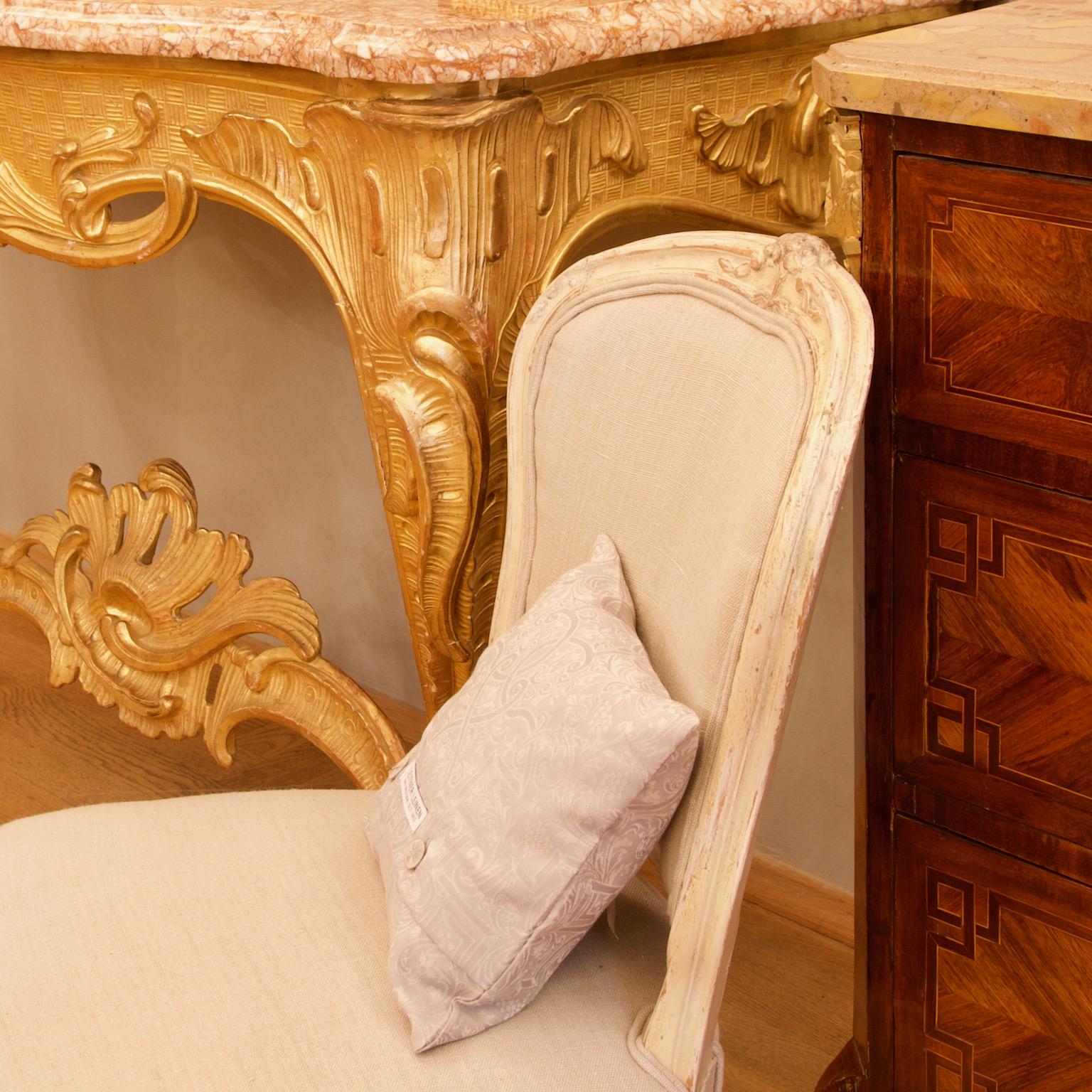 Mid-18th Century French Regence/Louis XV Carved Gilt Wood Rocaille Console Table

Large, impressive French Régence or early Louis XV console table of finely carved and gilded wood with the original yellow and red marble top of serpentine outline.