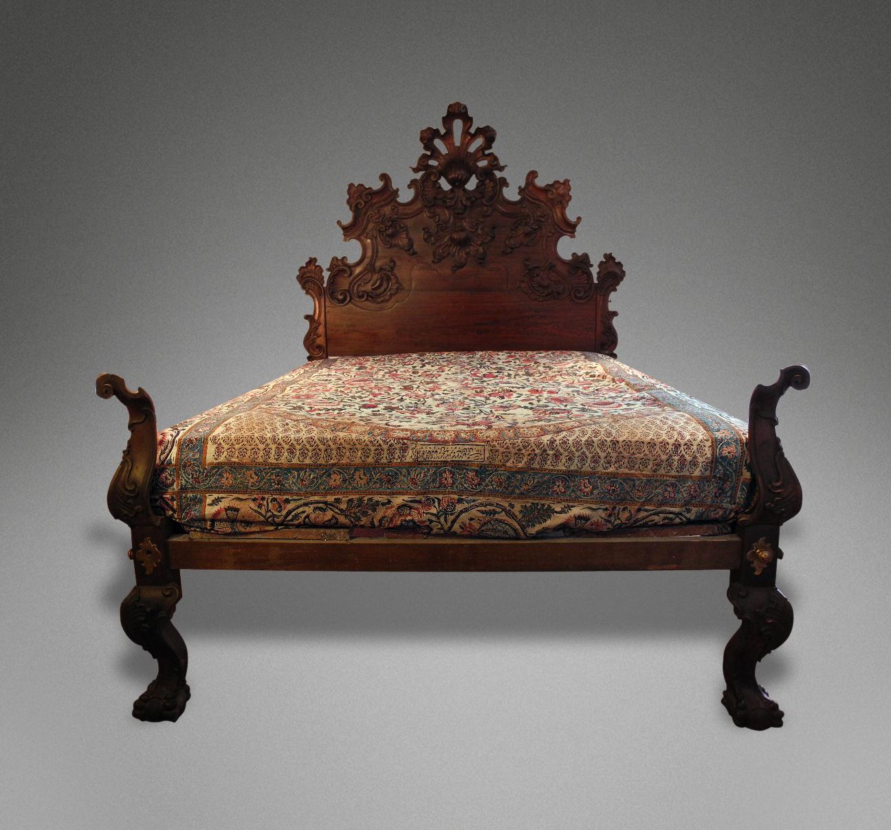 Superbe hand carved padauk wood Indo-Portuguese bed.