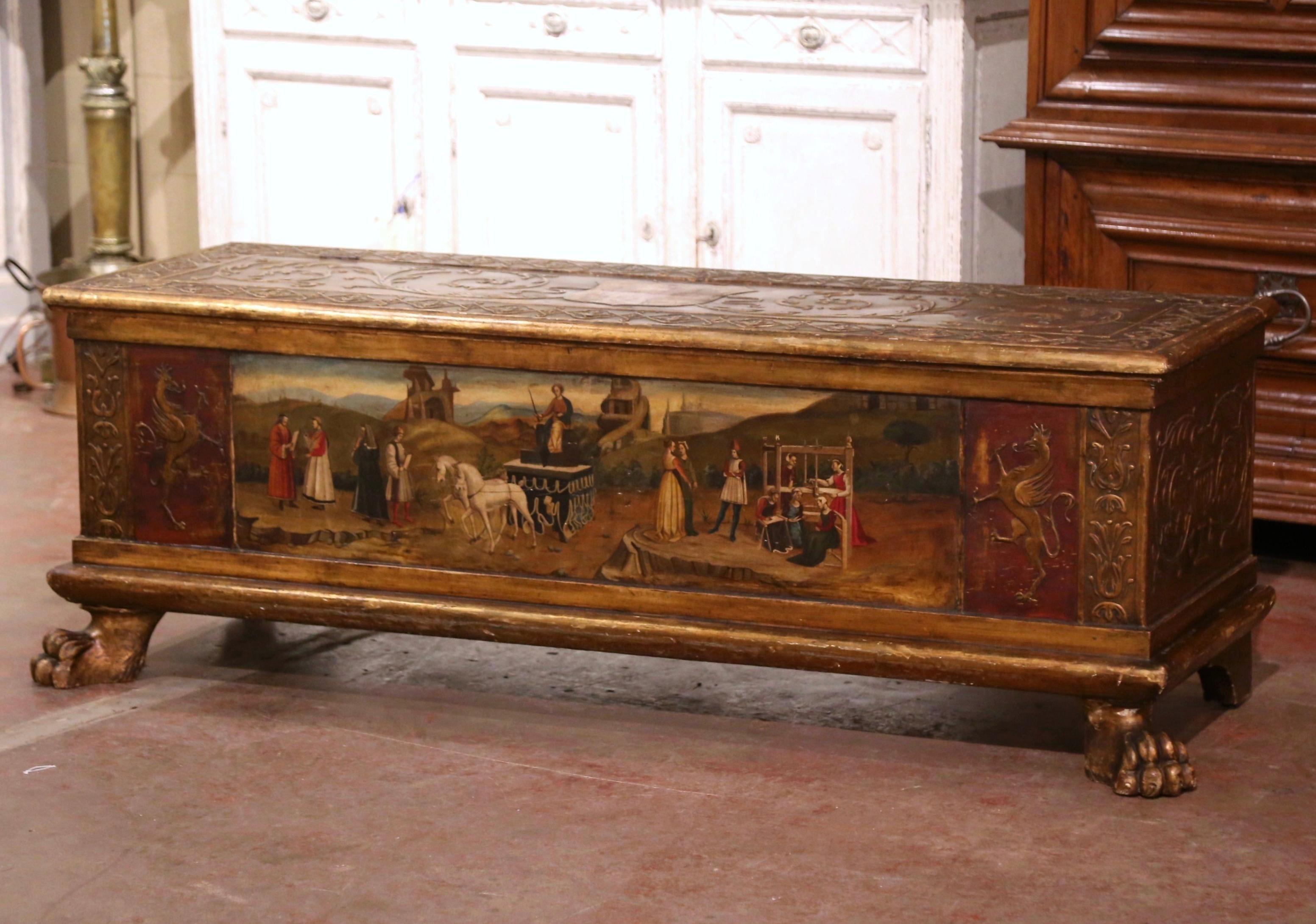 Place this colorful antique coffer at the foot of a king size bed to store your extra blankets! Crafted in Italy, circa 1760, the rectangular cabinet sits on front paw feet over a bottom straight plinth; it features elegant carved panels on the
