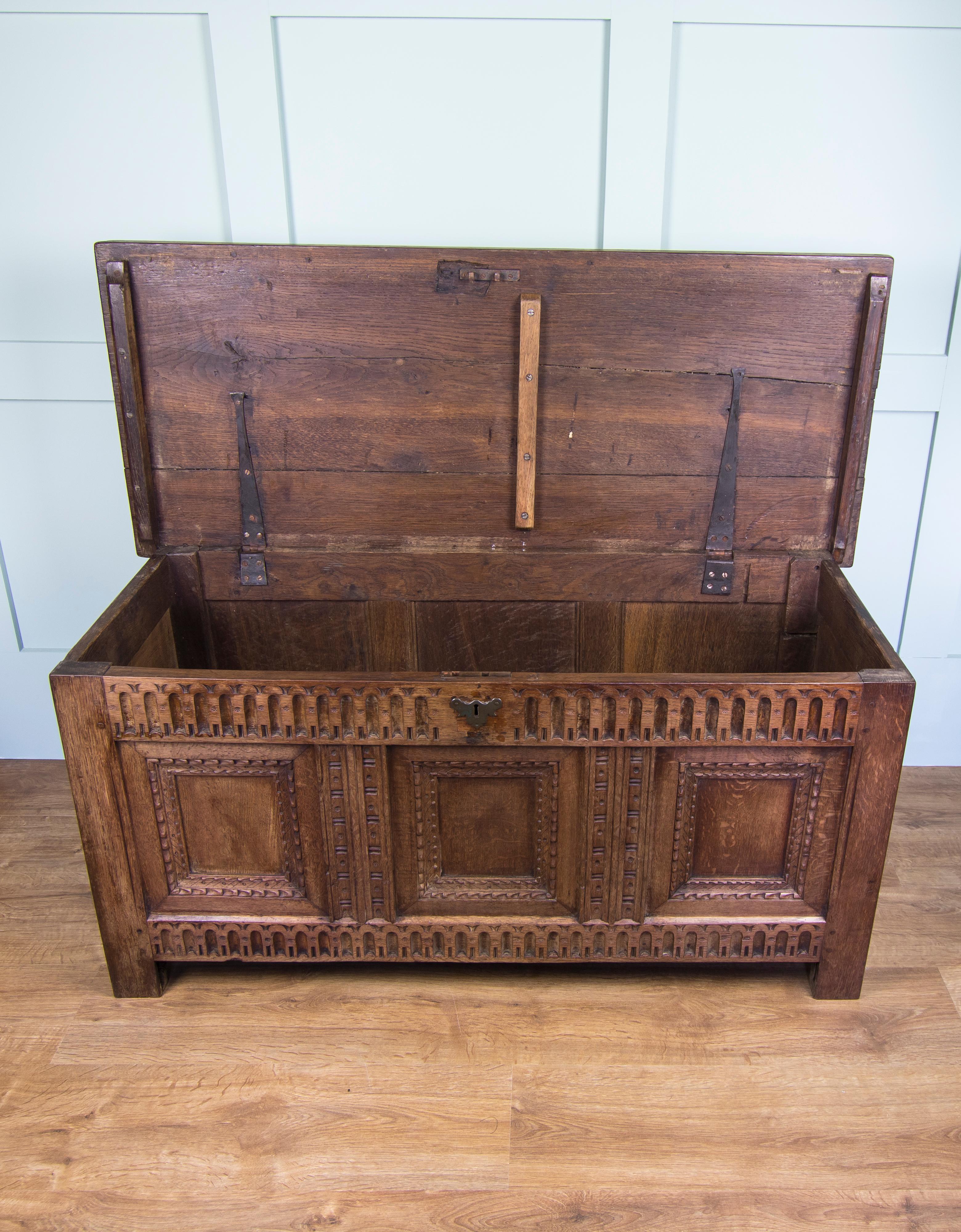 British Mid-18th Century Oak Coffer Chest with Three-Panel Decorative Front For Sale