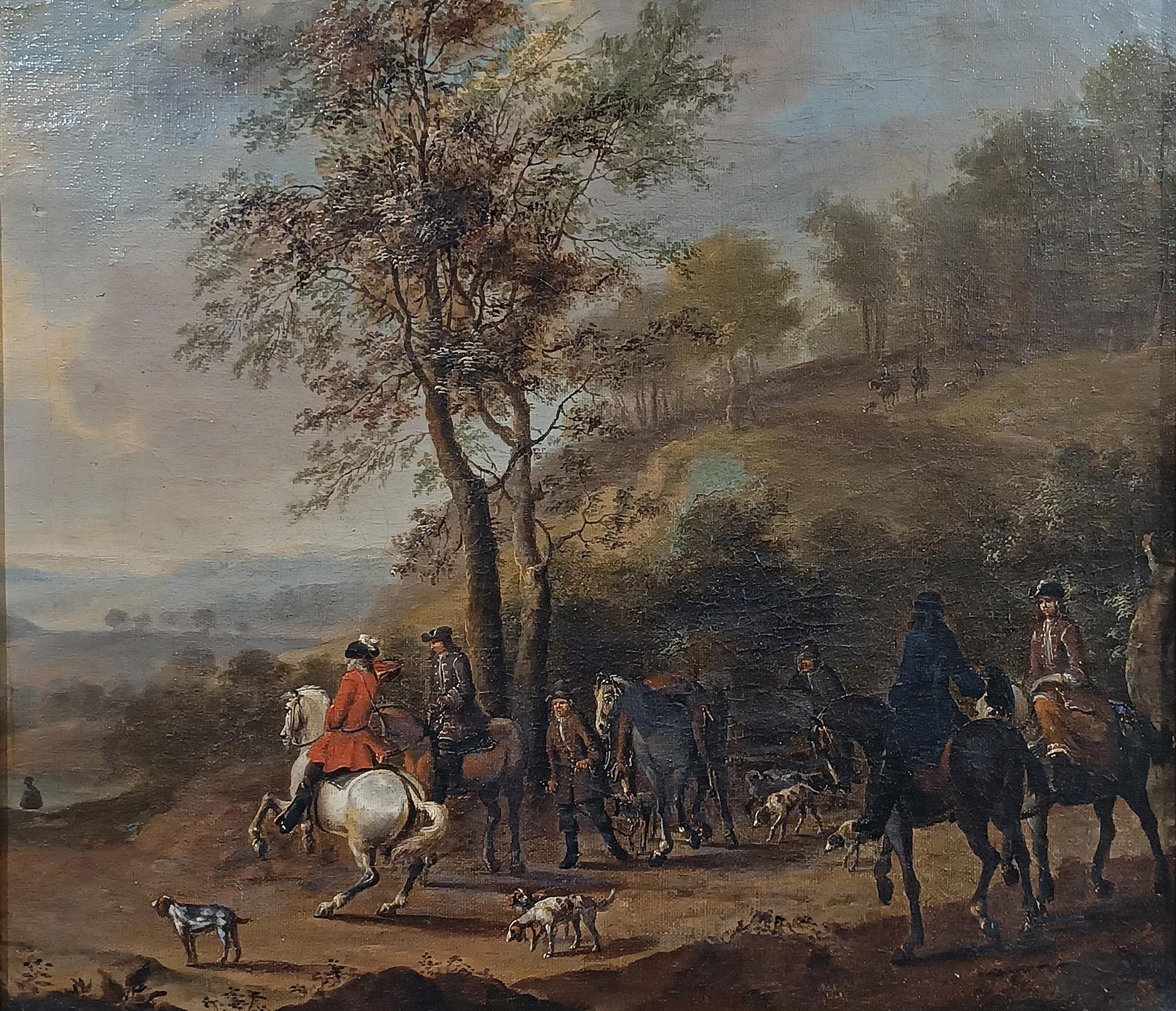 Bellissimo dipinto a olio su tela, incorniciato in legno intagliato e dorato con foglia d'oro. La scena raffigura una caccia, con figure di cacciatori a cavallo in primo piano e in lontananza, circondati da cani pronti a cacciare. L'ambiente è