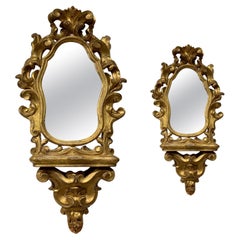 MID-18th CENTURY PAIR OF MIRRORS WITH SHELF