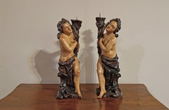 MID-18th CENTURY PAIR OF PAINTED WOODEN CANDELABRA