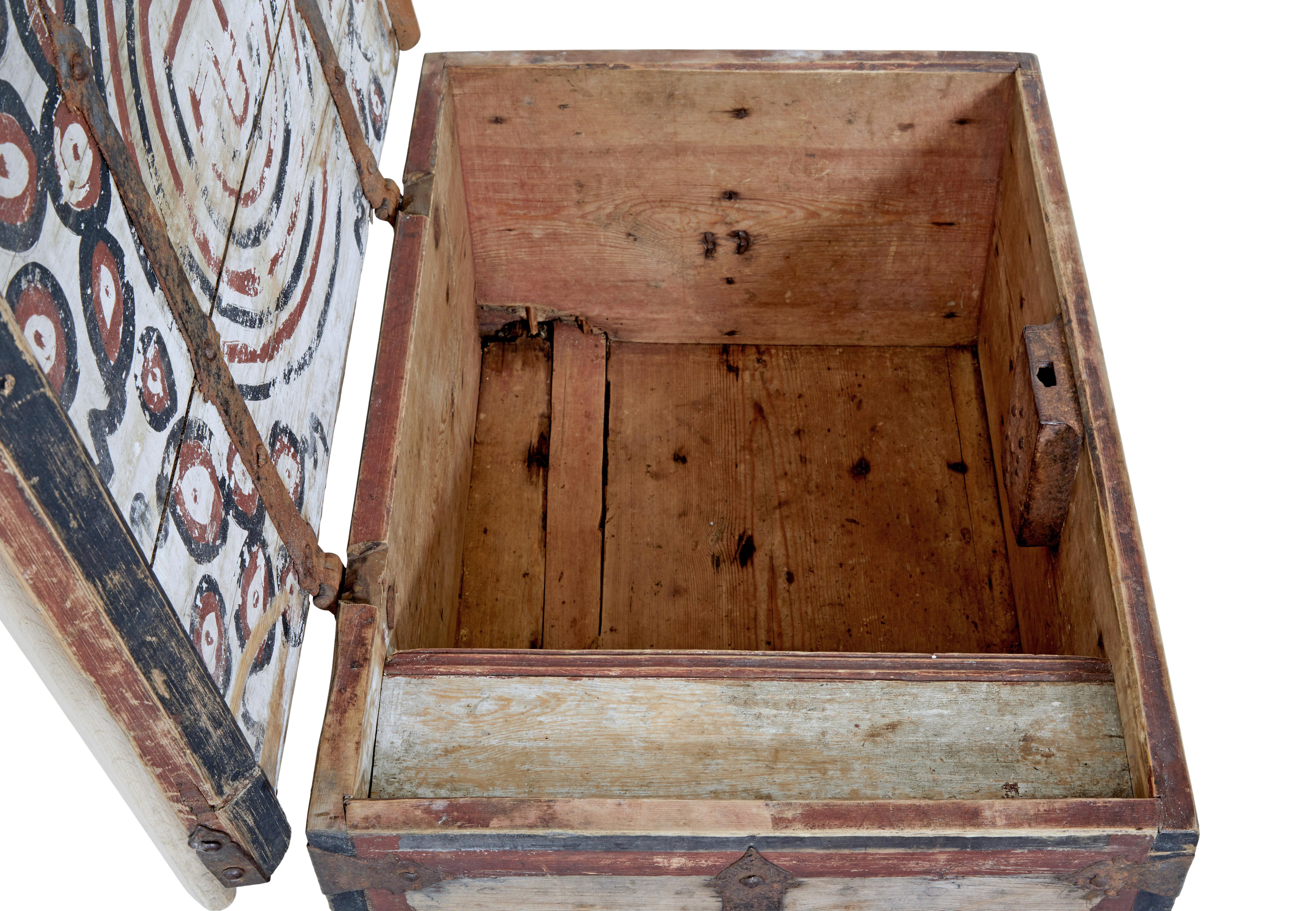 Mid 18th century swedish pine chest decorated with labyrinth circa 1730.

Rare and beautiful Swedish pine chest.   Traces of original paint to the outside with decorative metal strap work and hinges, woodwork has taken on a great patina in its