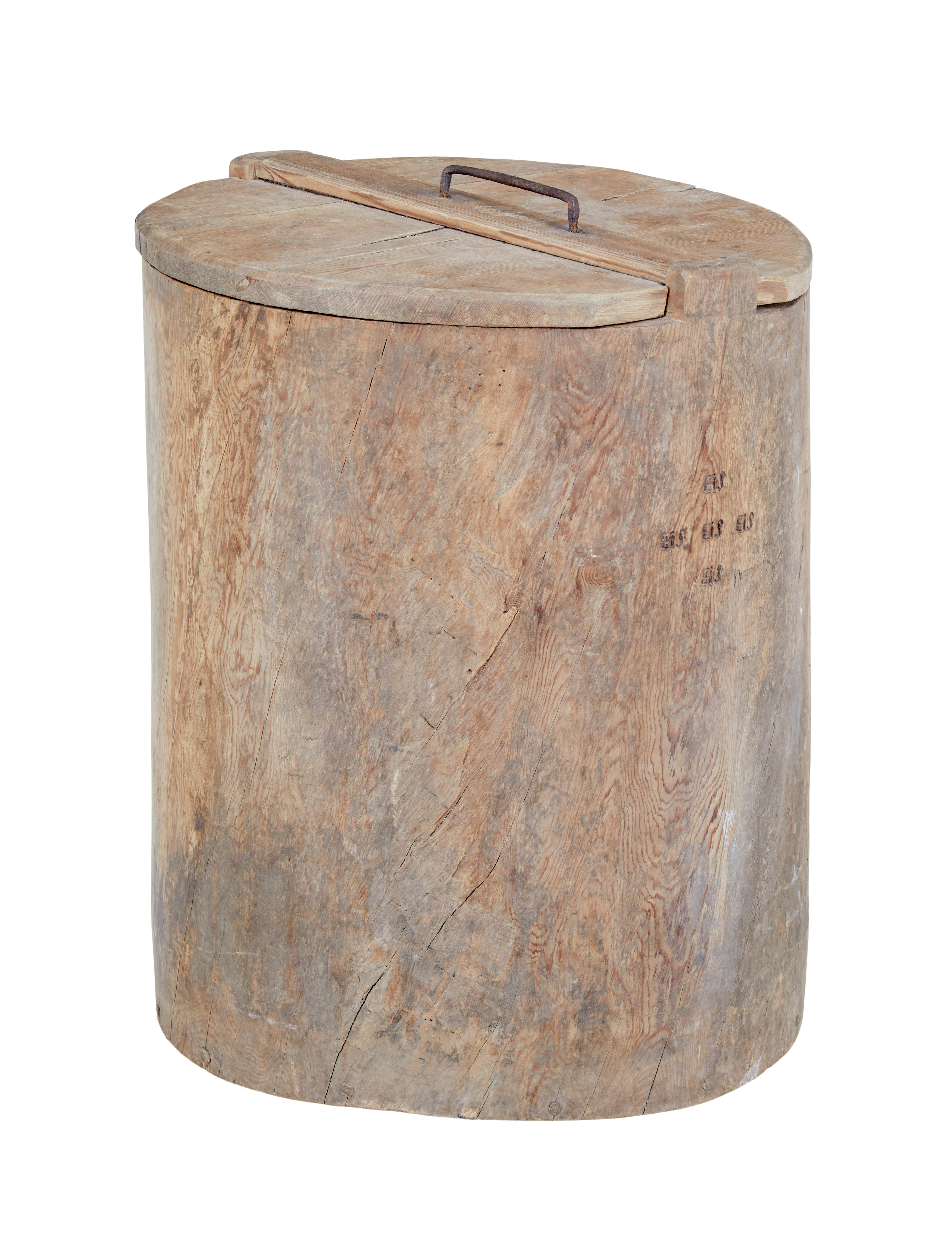 Mid 18th century Swedish pine trunk flour bin circa 1749.

Here we offer a rare mid 18th century flour storage bin, made from using a section of a large pine tree trunk, which has been hollowed out to provide space for storage. Original lid which