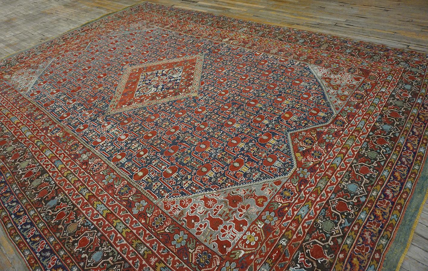 Carpets from Ghiordes in west Anatolia are particularly rare in room sizes. This published example has an allover posie pattern centered by a sharply drawn lozenge medallion , with eight patterned borders, the widest with a stylized palmette