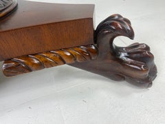 Mid 19 century hand carved mahogany tilt top table