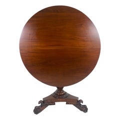 Mid 19 century hand carved mahogany tilt top table