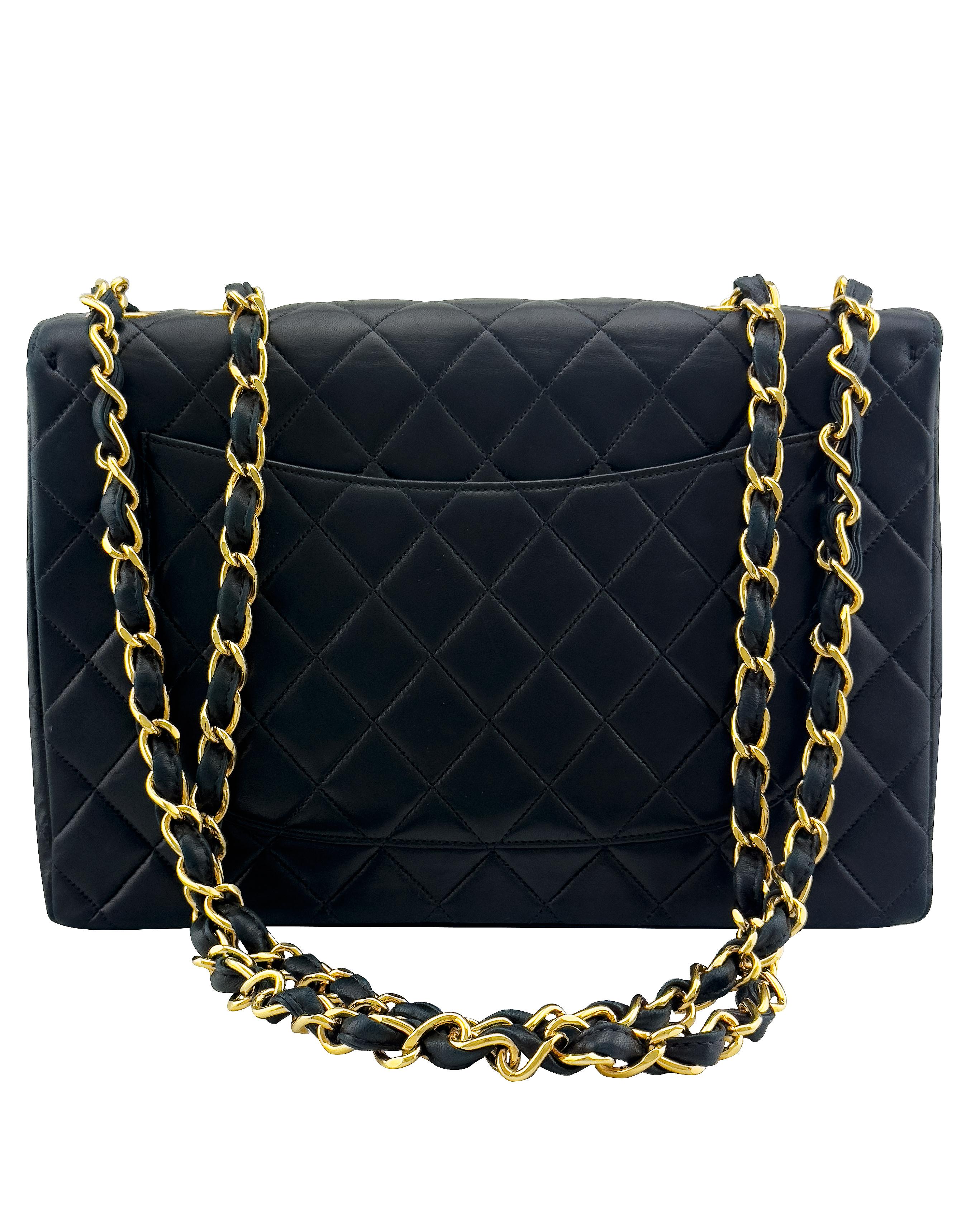 Mid 1990s Chanel Black Quilted Lambskin Jumbo Flap Bag with 24K Gold Hardware In Good Condition For Sale In Toronto, Ontario