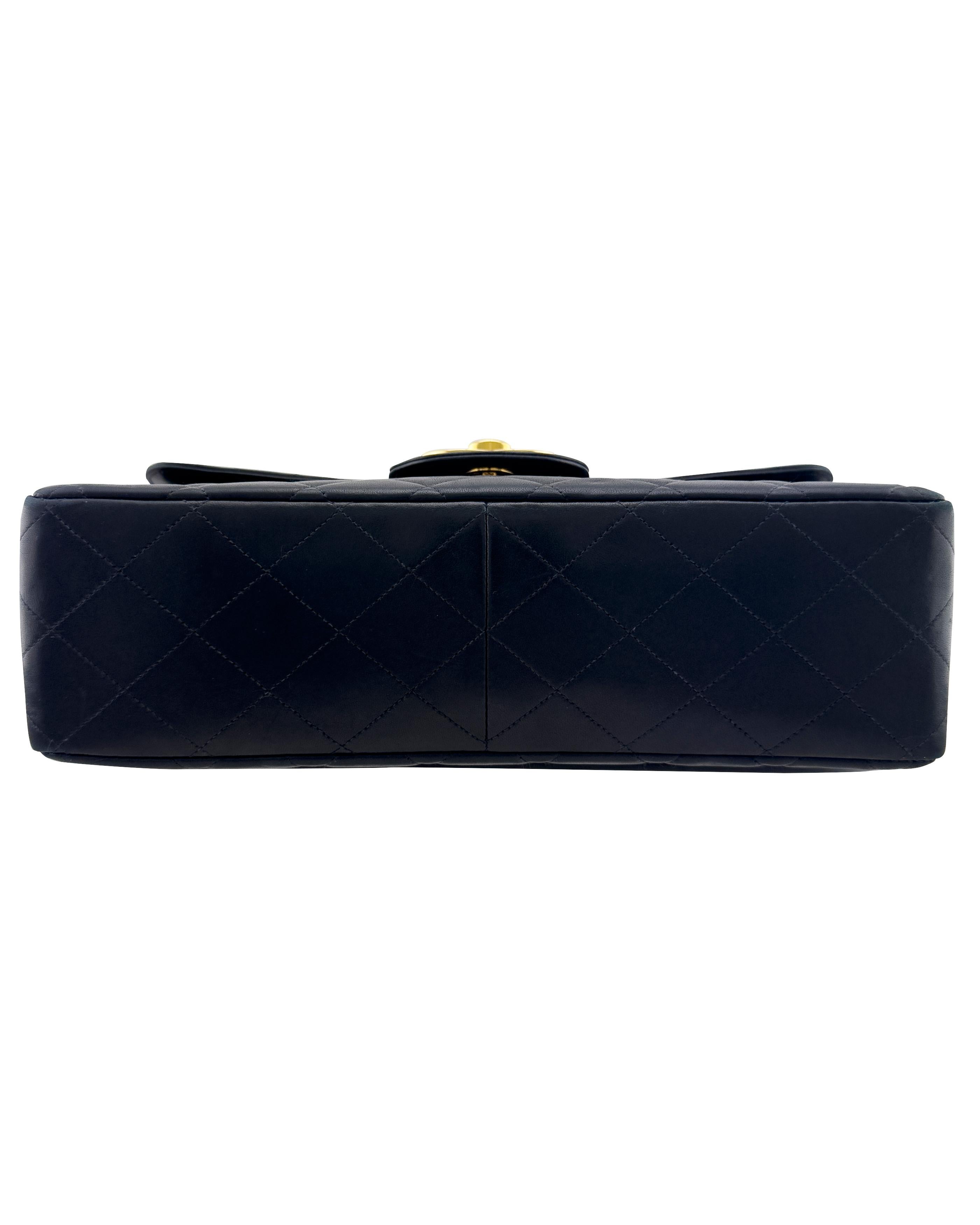 Mid 1990s Chanel Black Quilted Lambskin Jumbo Flap Bag with 24K Gold Hardware For Sale 1