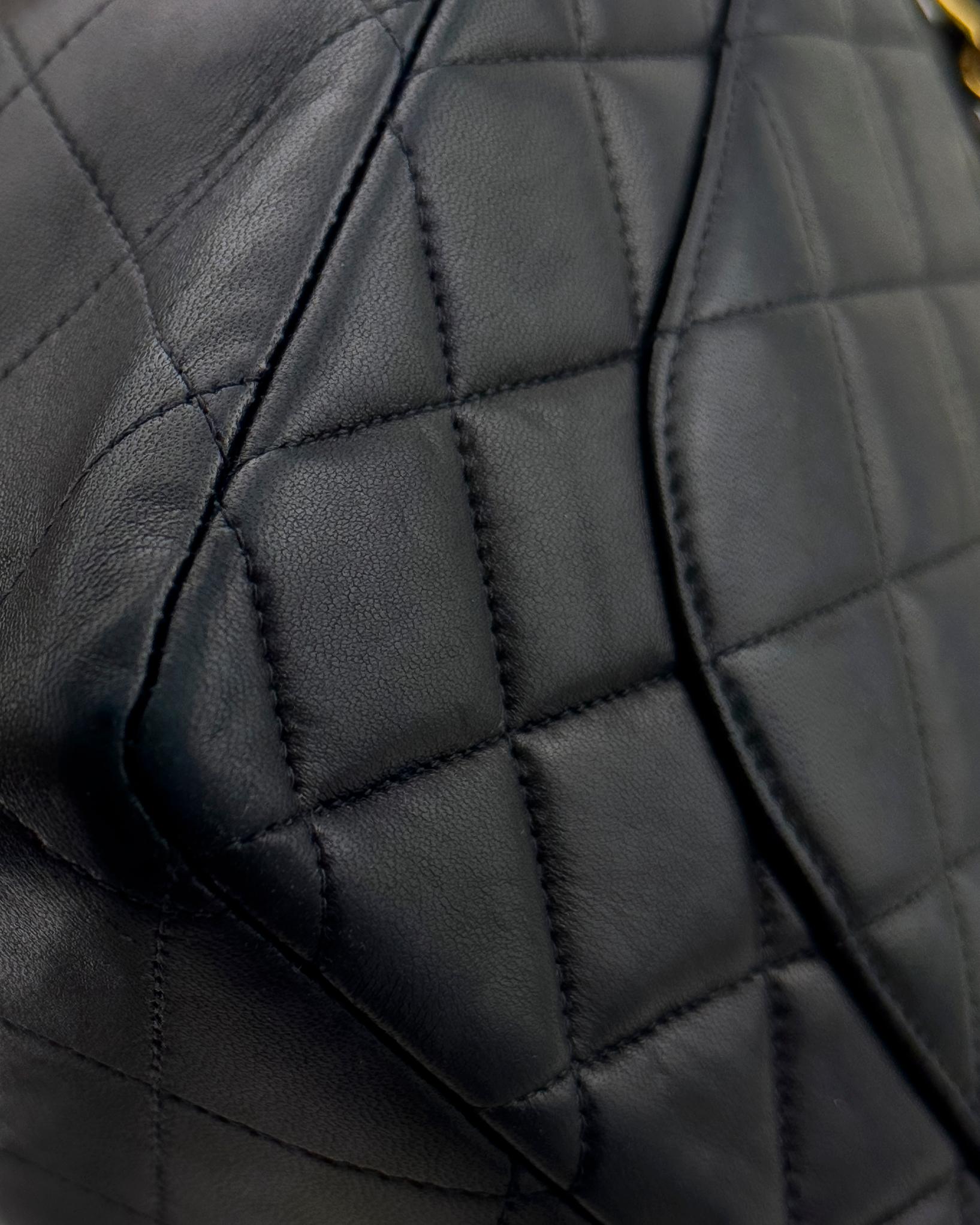 Mid 1990s Chanel Black Quilted Lambskin Jumbo Flap Bag with 24K Gold Hardware For Sale 2