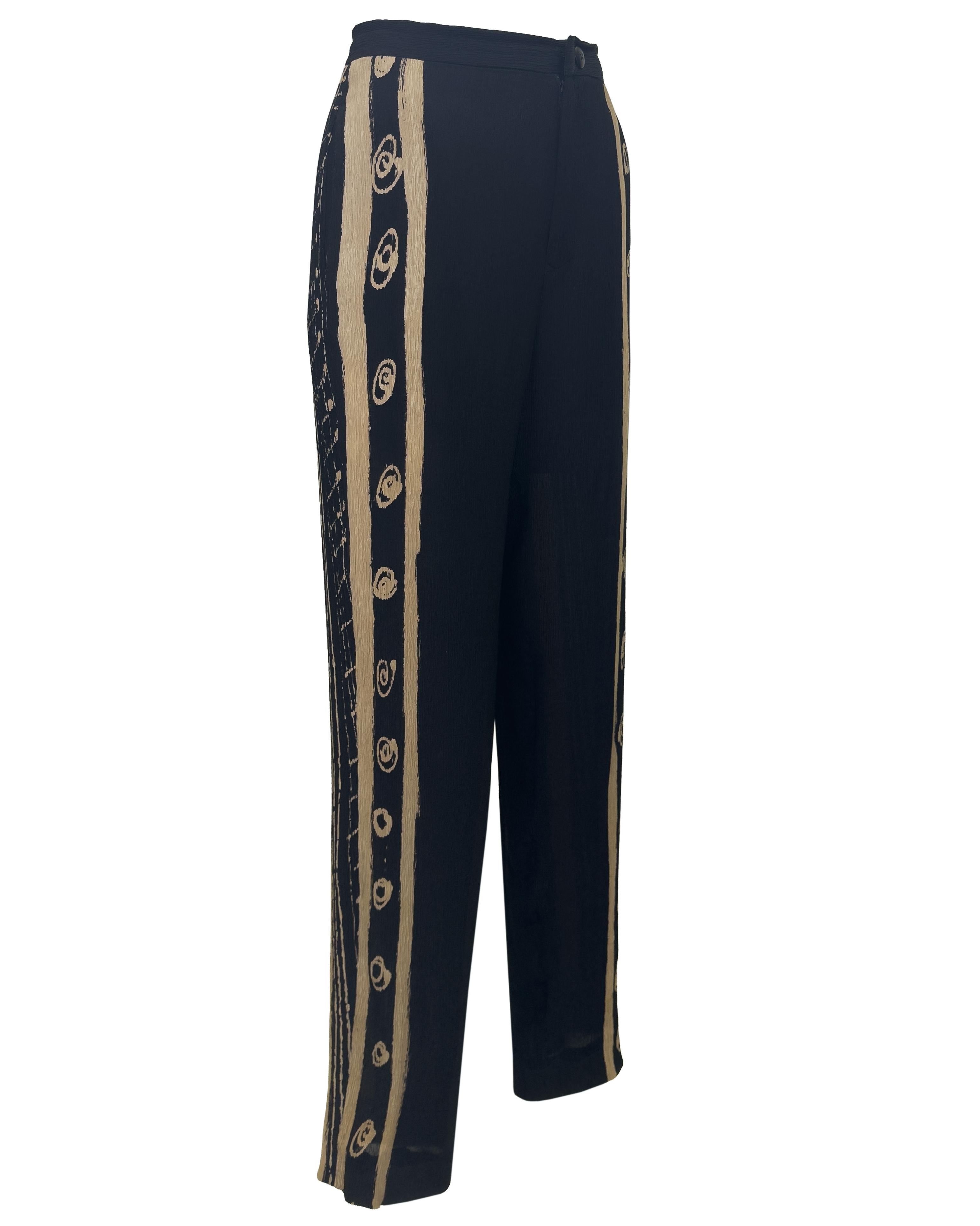 Black and beige pants from Japanese designer Issey Miyake. Crafted in Japan from 100% silk, these trousers feature the designer's signature plissé texture - a technical, finely pleated finish that offers both structure and fluidity. Abstract beige