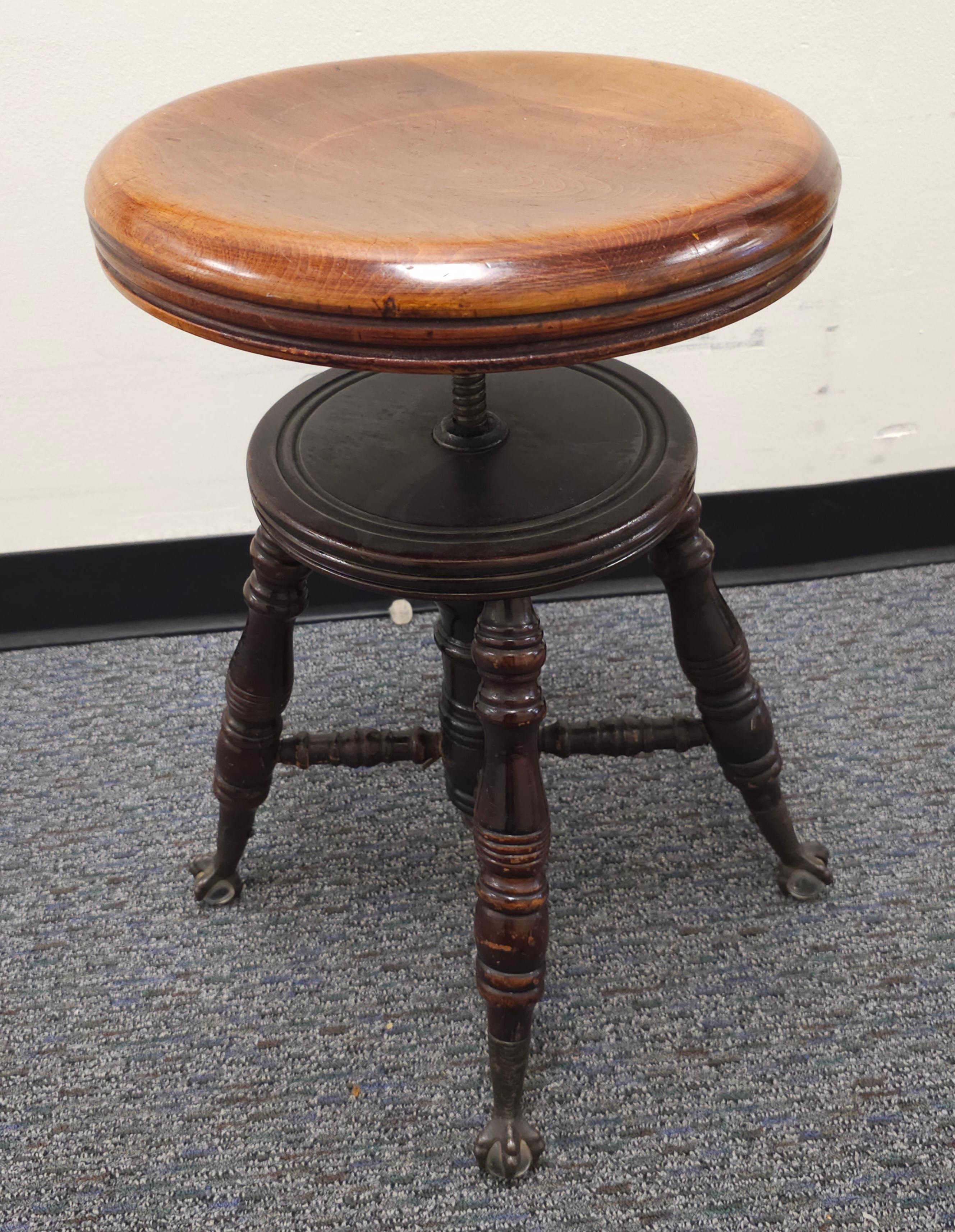 Mid-19th Century Vicotian  Mahogany and Iron Piano Stool with Ball Claw Feet by Charles Parker. Measures 14