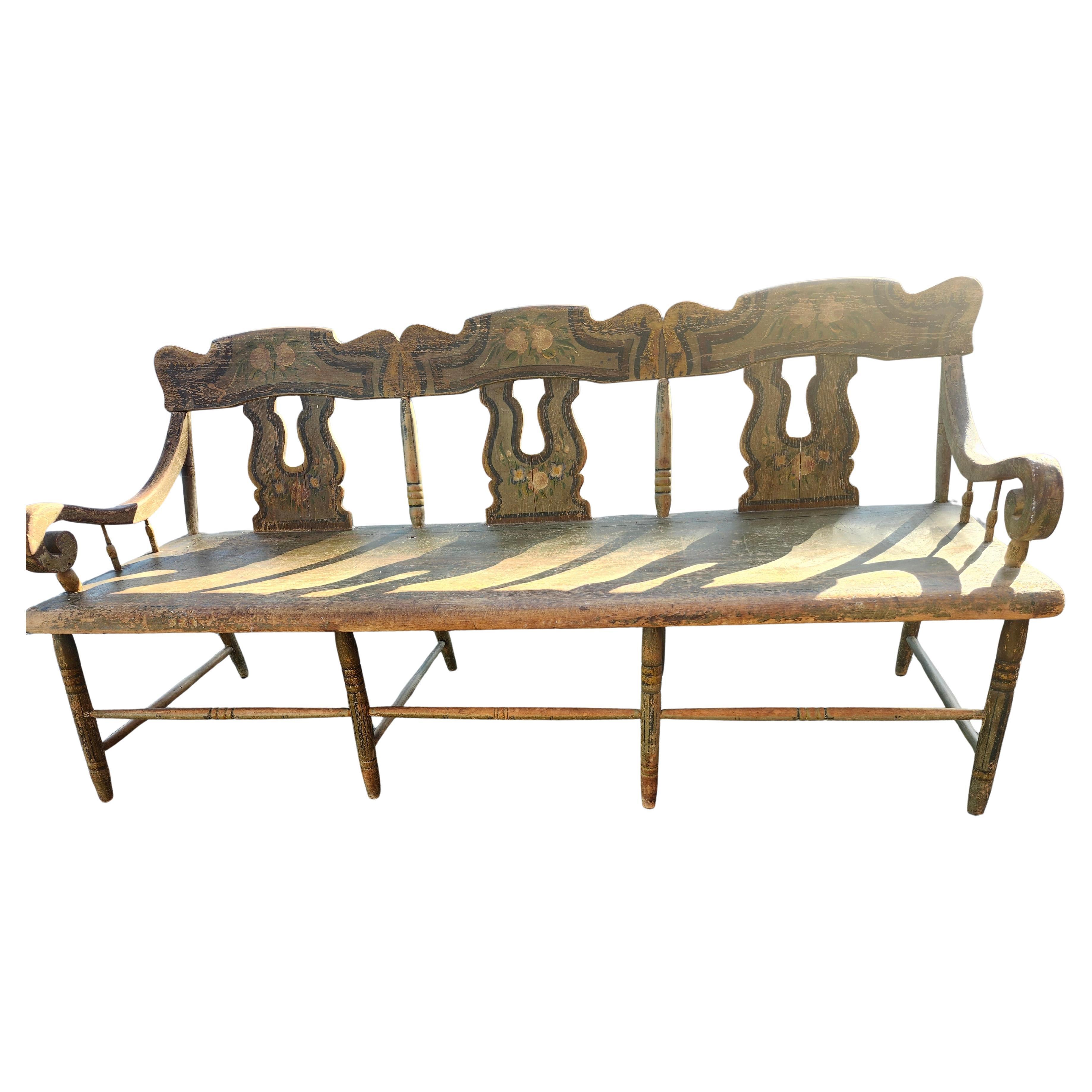 Fantastic, from Lancaster County, Pennsylvania this totally hand built and hand painted 3 seat settle with a one piece plank bench seat has remained untouched with the exception of the two end stretchers which wete professionally replaced. Found in