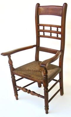 Mid 19th C. Rush Seated Ladder Back Chair. English, circa 1850