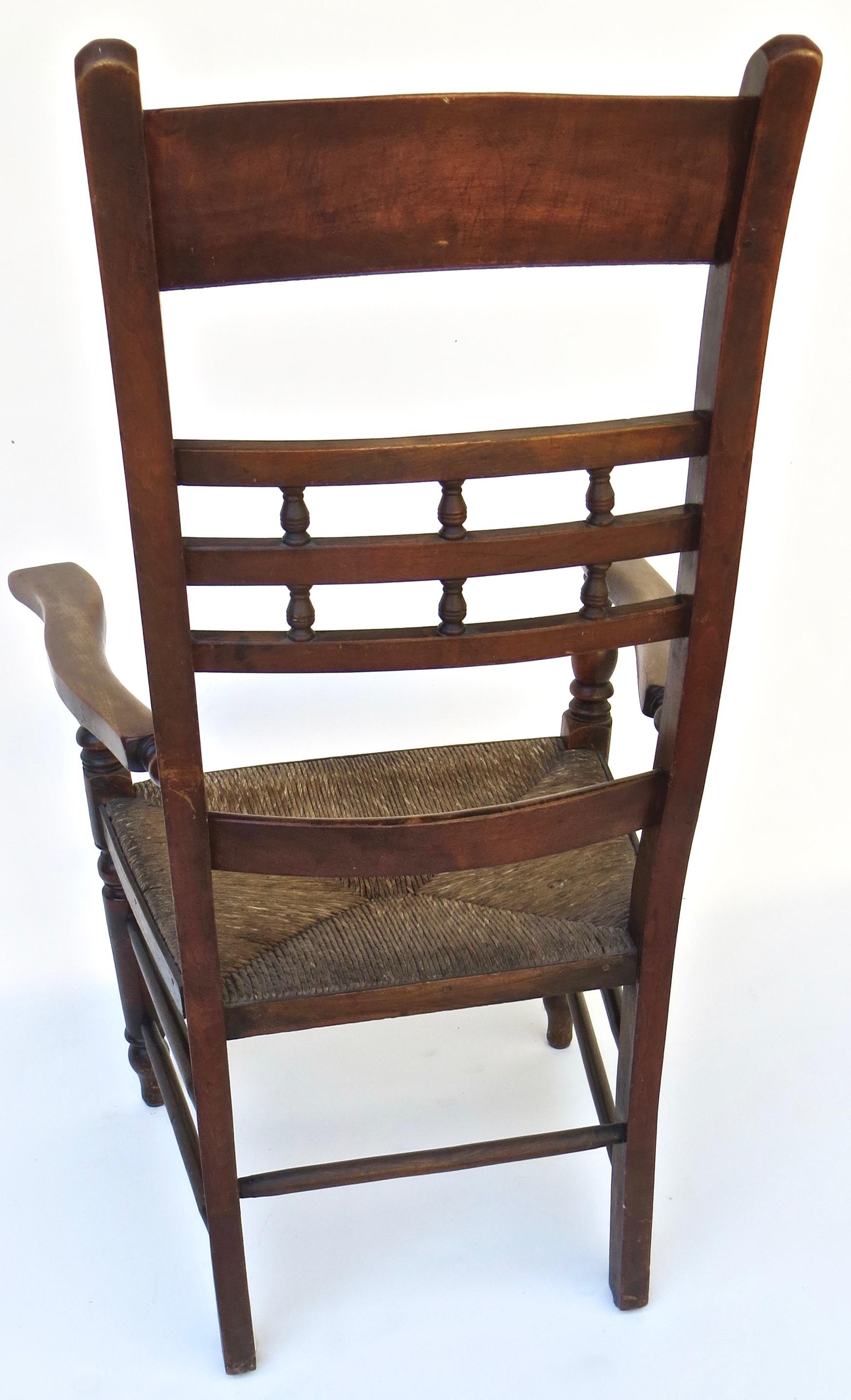 Victorian Mid 19th C. Rush Seated Ladder Back Chair. English, circa 1850 For Sale