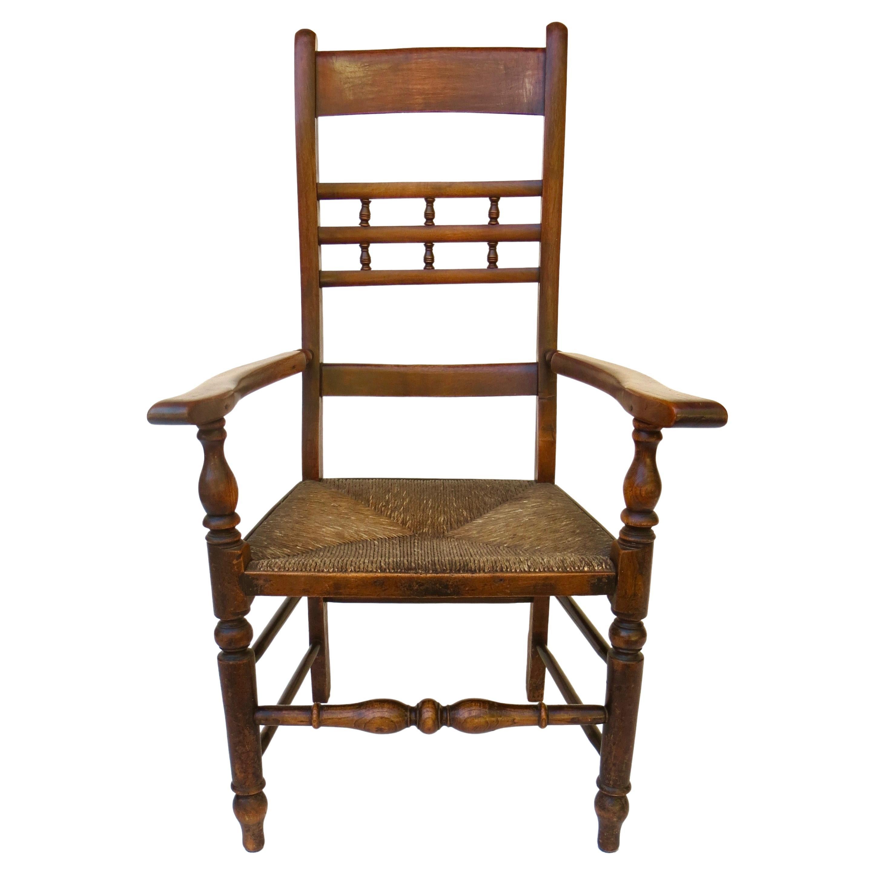 Mid 19th C. Rush Seated Ladder Back Chair. English, circa 1850