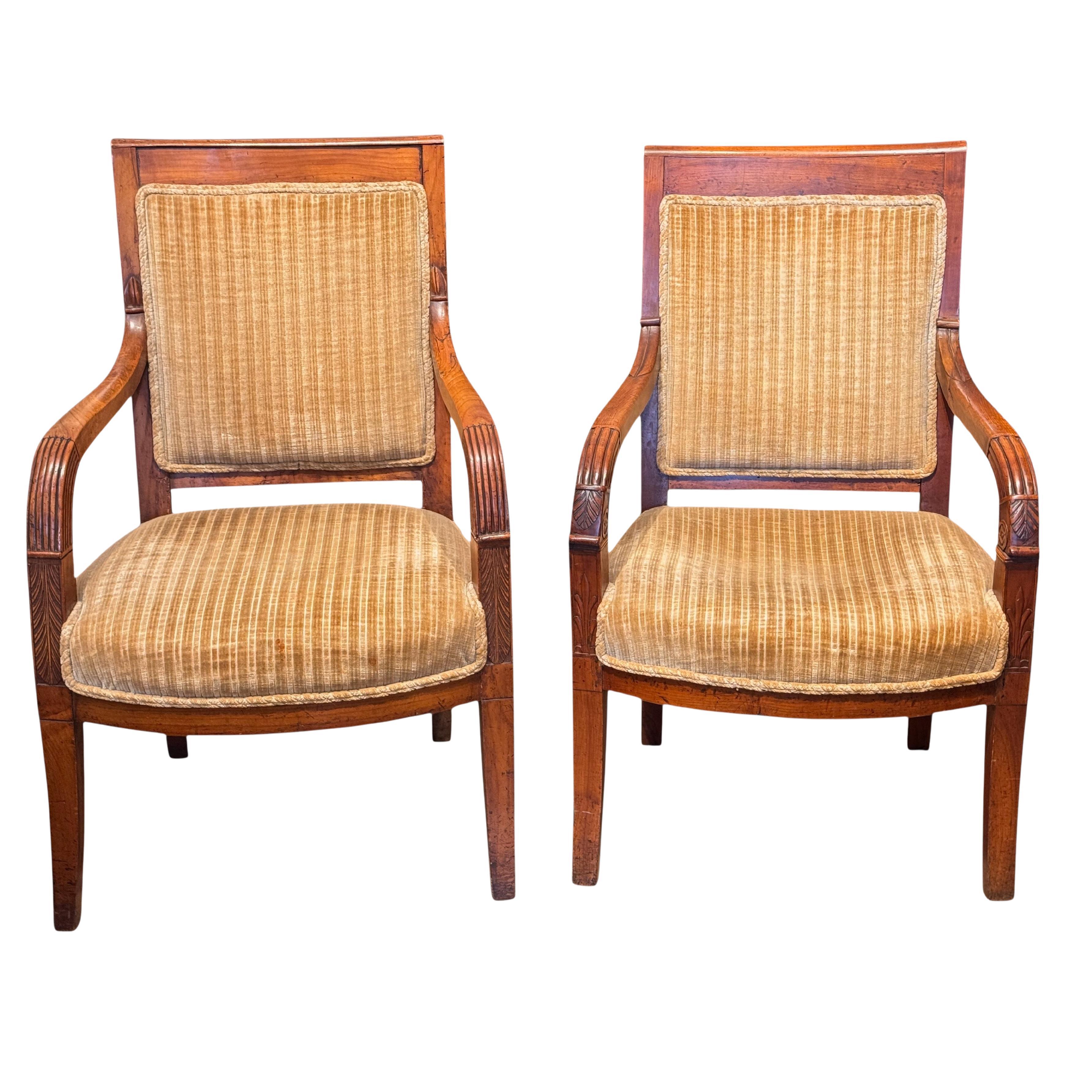 Mid 19th Century A Near Pair of Empire Style Fauteuils With Carved Arm Detail