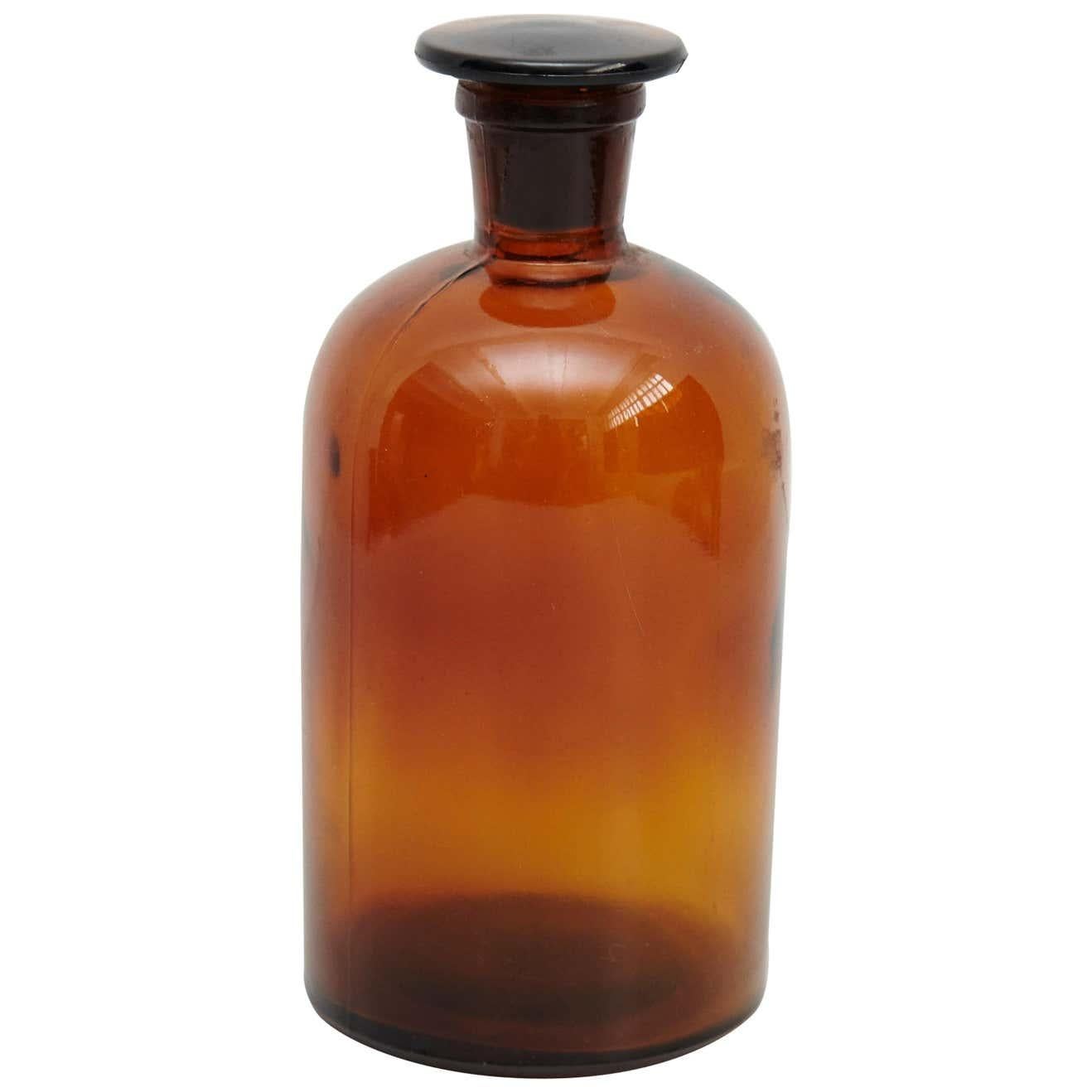 Mid-Century Modern Mid-19th Century Amber Apothecary Glass Bottle with Lid For Sale