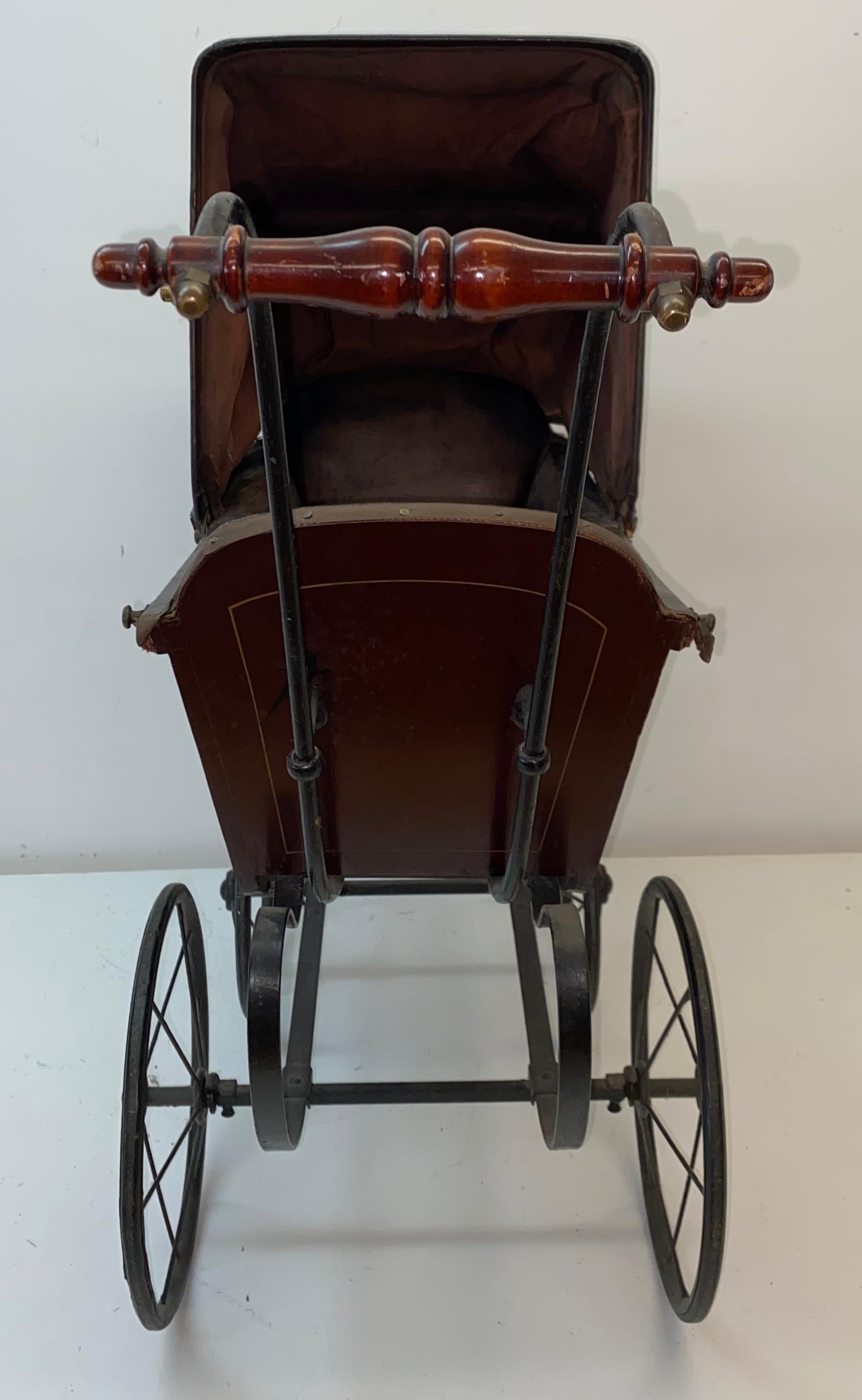 Mid 19th century baby carriage / stroller by F. A. Whitney, Leominster, Massachusetts 

Leather and metal baby carriage

For display, or your doll collection

This fine baby carriage was made for an infant and was the highest quality of it's