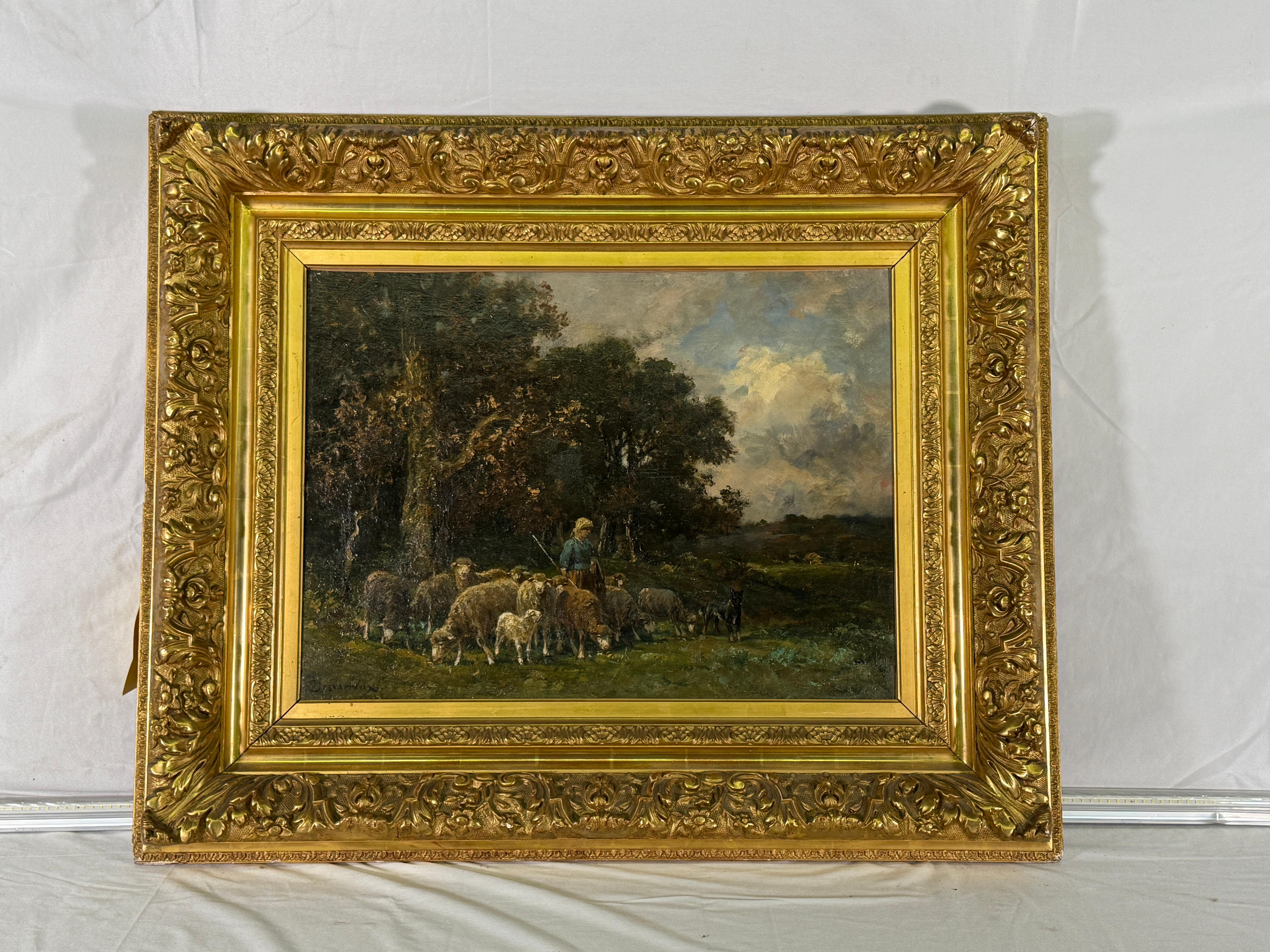 Mid 19th Century Barbizon Landscape with Sheep - By James Desvarreaux
Beautiful painting purchased in France. Age appropriate wear, see detailed photos or message us with questions. Giltwood Frame. 

Dimensions Inside Frame: Height 19.25