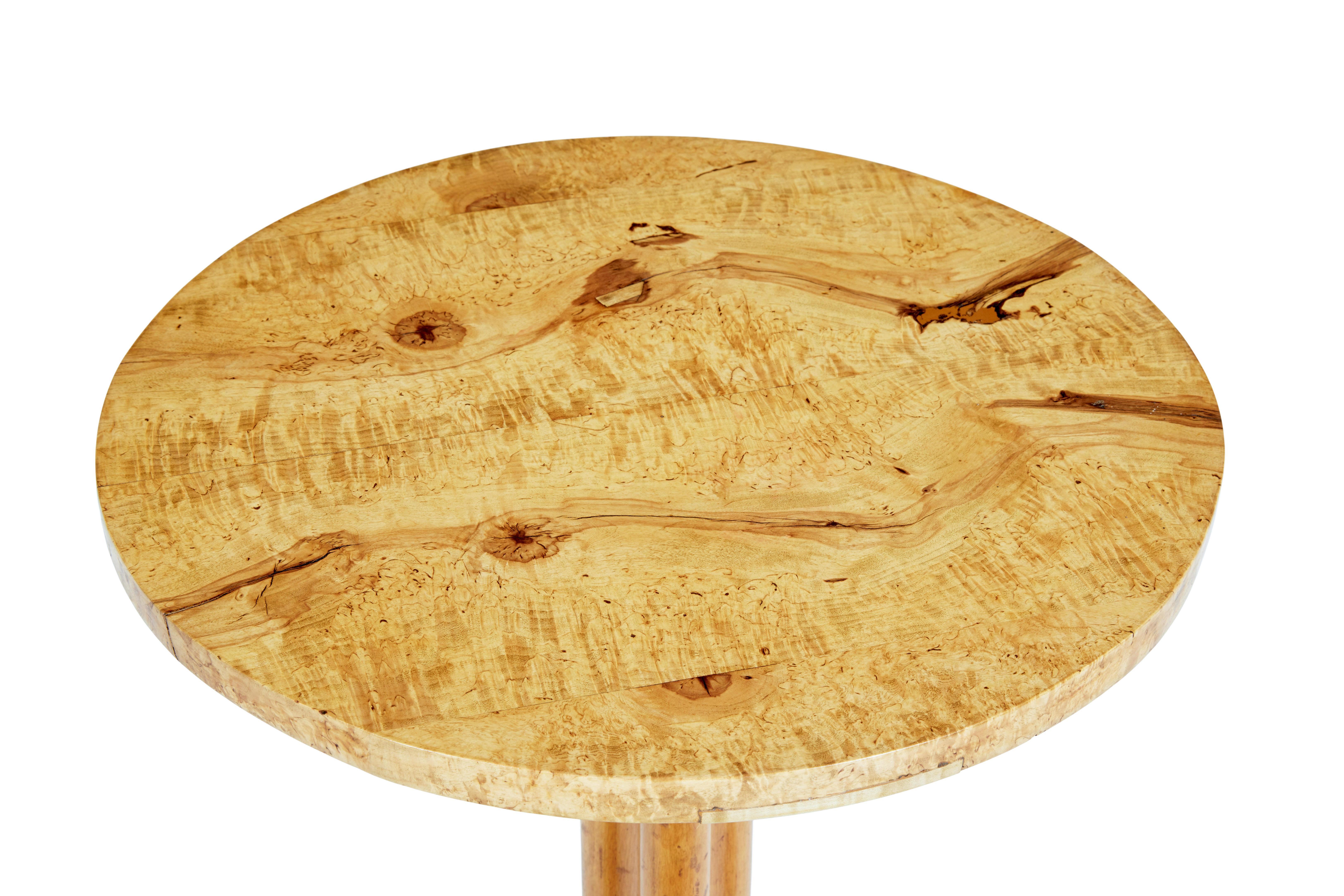 Good quality Swedish birch root table, solid burr birch circular top, standing on shaped stem and scrolled legs.
Rich golden colour.
Area of restoration to the top were a wood knot was, but this has been done sympathetically and when the table was