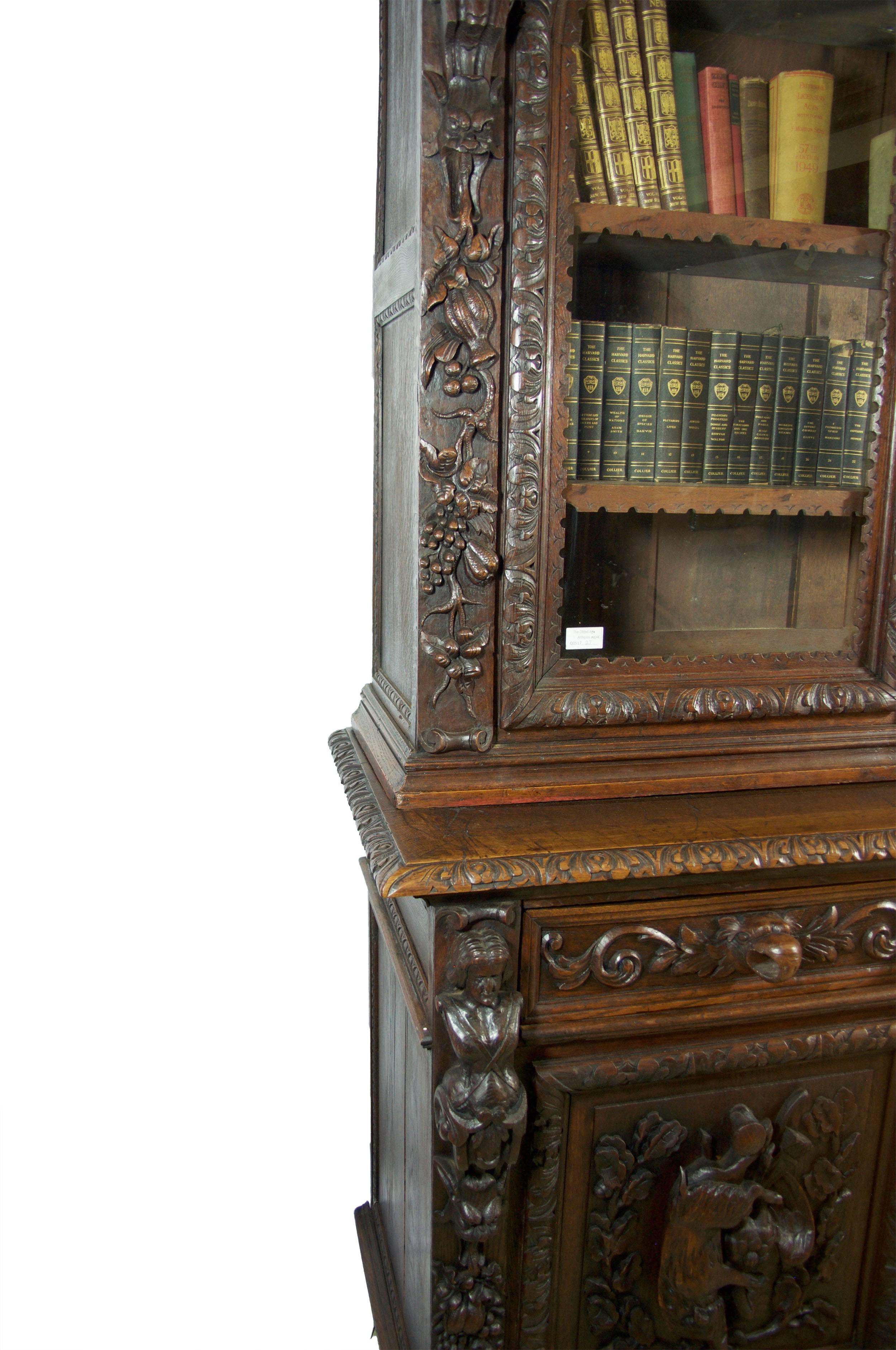 German Mid-19th Century Black Forest Carved Oak Bookcase