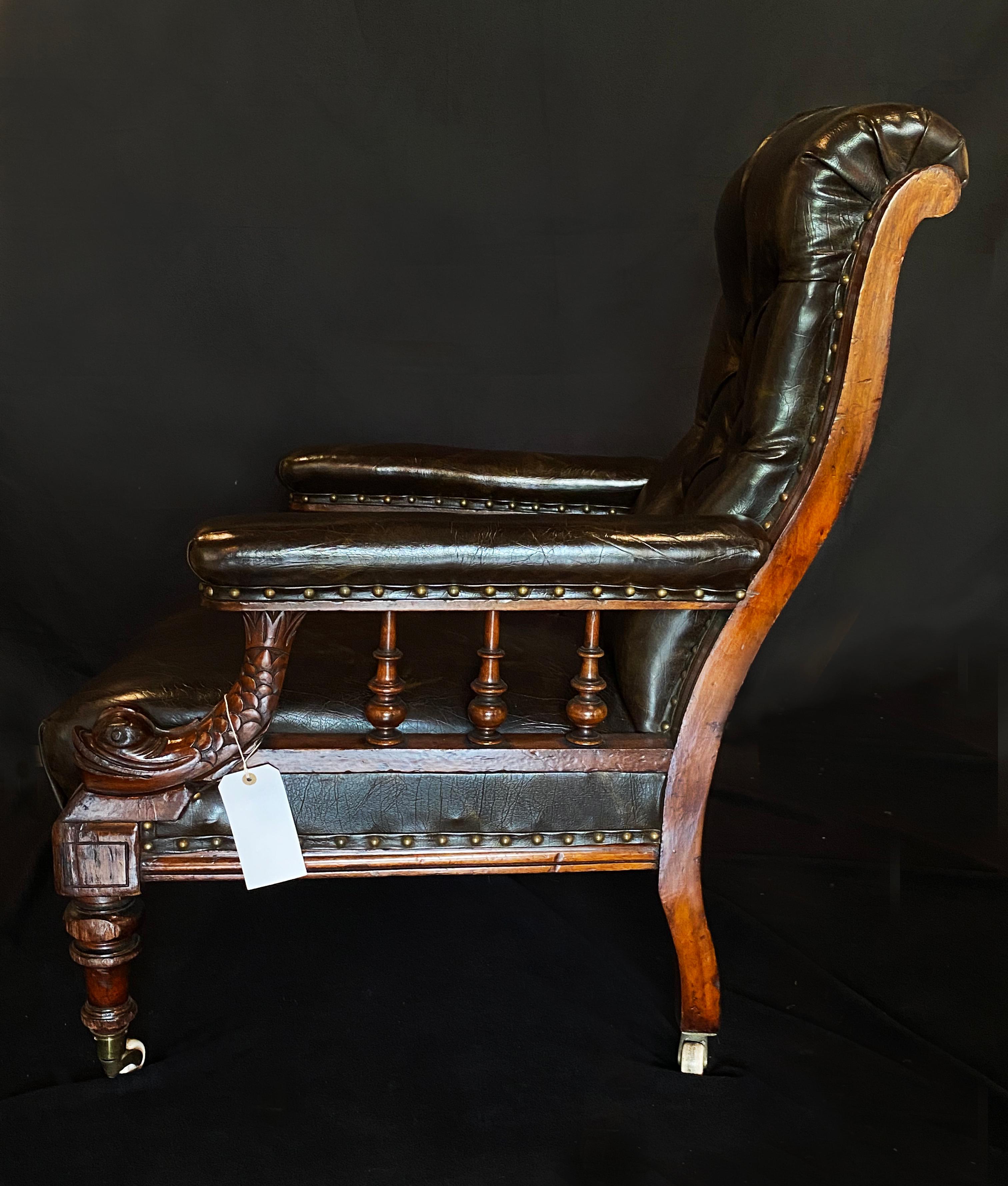 Mid 19th Century Brown Leather Library Chair with Carved Dolphin Arms, Mahogany In Excellent Condition For Sale In Shrewsbury, GB