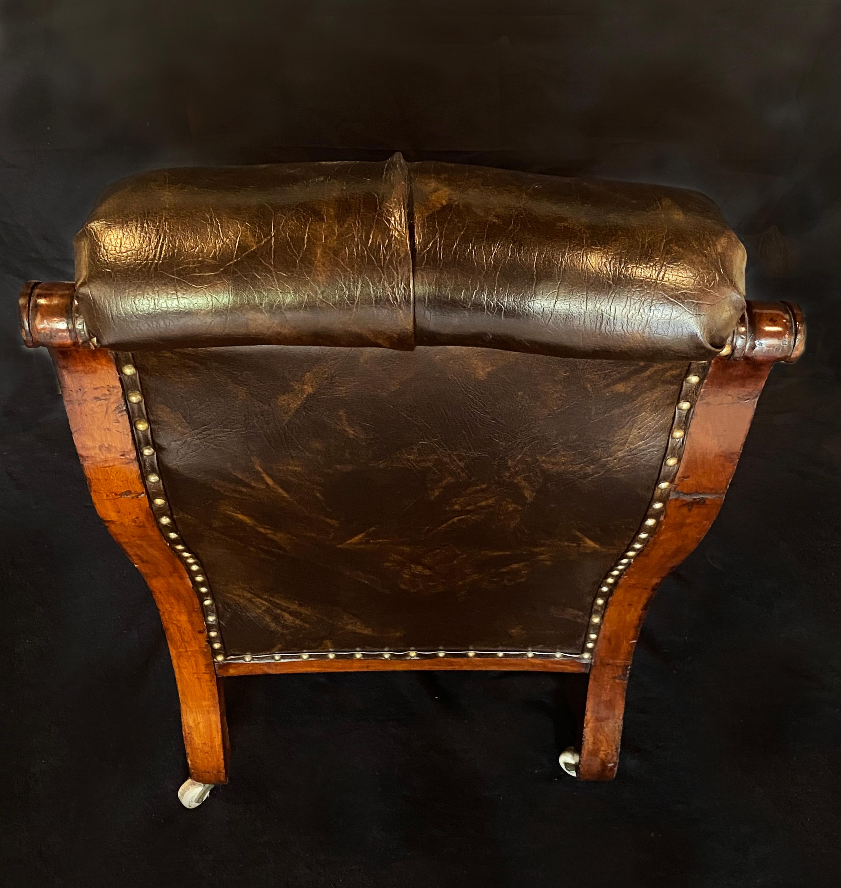 Mid 19th Century Brown Leather Library Chair with Carved Dolphin Arms, Mahogany For Sale 1