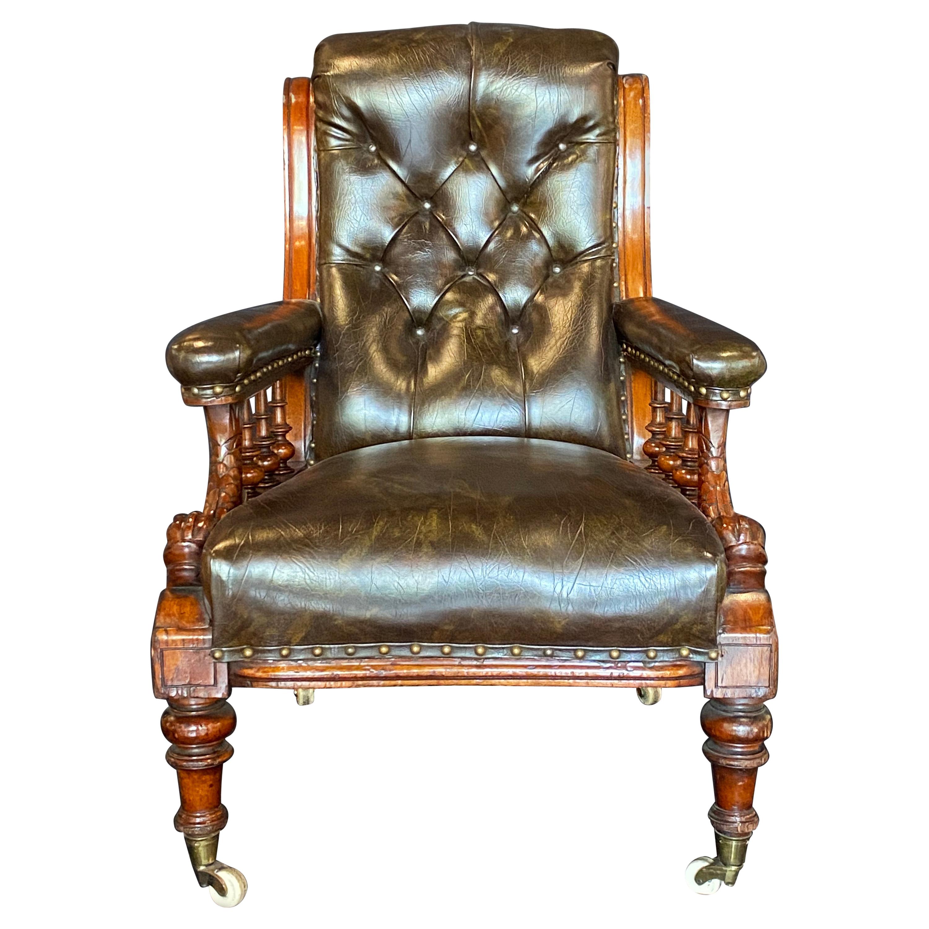 Mid 19th Century Brown Leather Library Chair with Carved Dolphin Arms, Mahogany