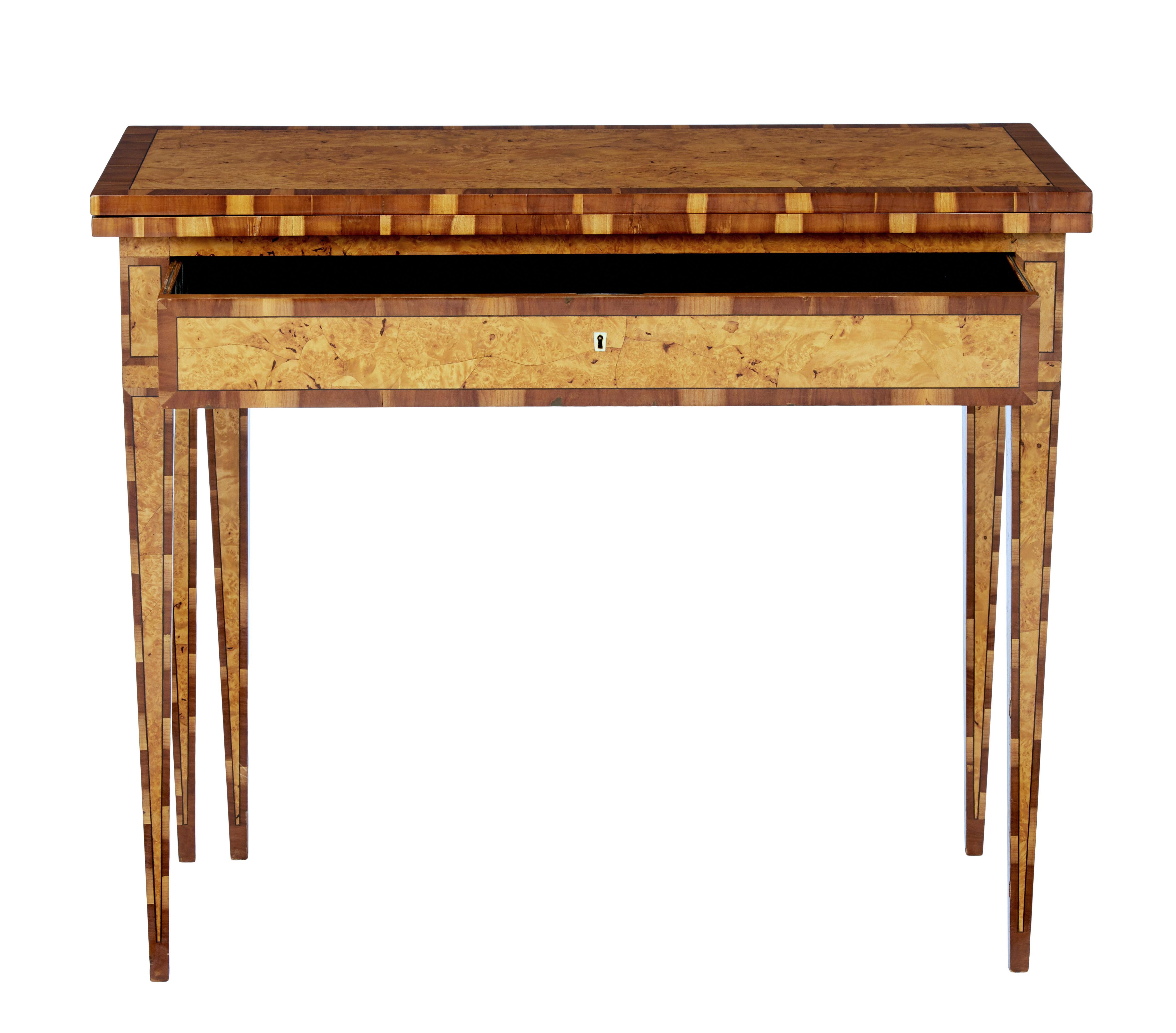 Rare burr birch and elm games table, circa 1860.

Beautiful rectangular burr birch tea table. Burr birch top with elm outer edge and ebonized stringing. Single drawer below the top surface, which has a hand painted back gammon board hand painted