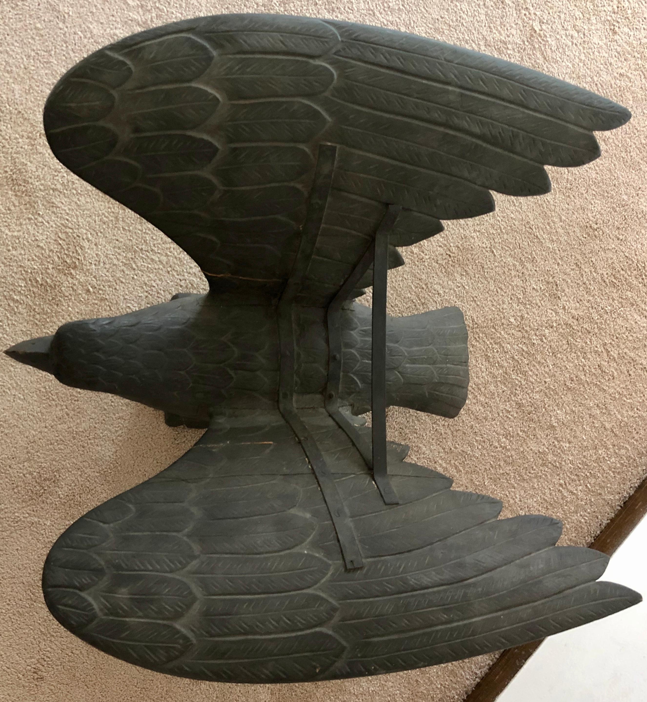 Impressive carved pilot house eagle with old greenish gray overpaint. In excellent condition for its age. These eagles were placed on the top of the pilot house in the mid to late 19th century in New England. A great piece of Americana.