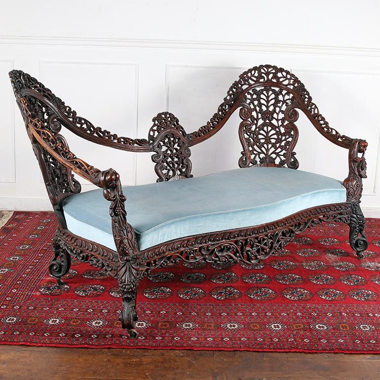 Hand-Carved Mid 19th Century Carved Anglo Indian Settee For Sale