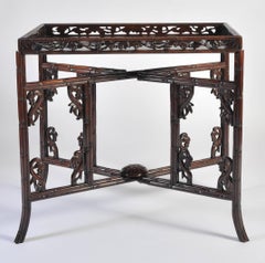 Mid-19th Century Carved Chinese Export Tray Table on Folding Stand of Huanghuali