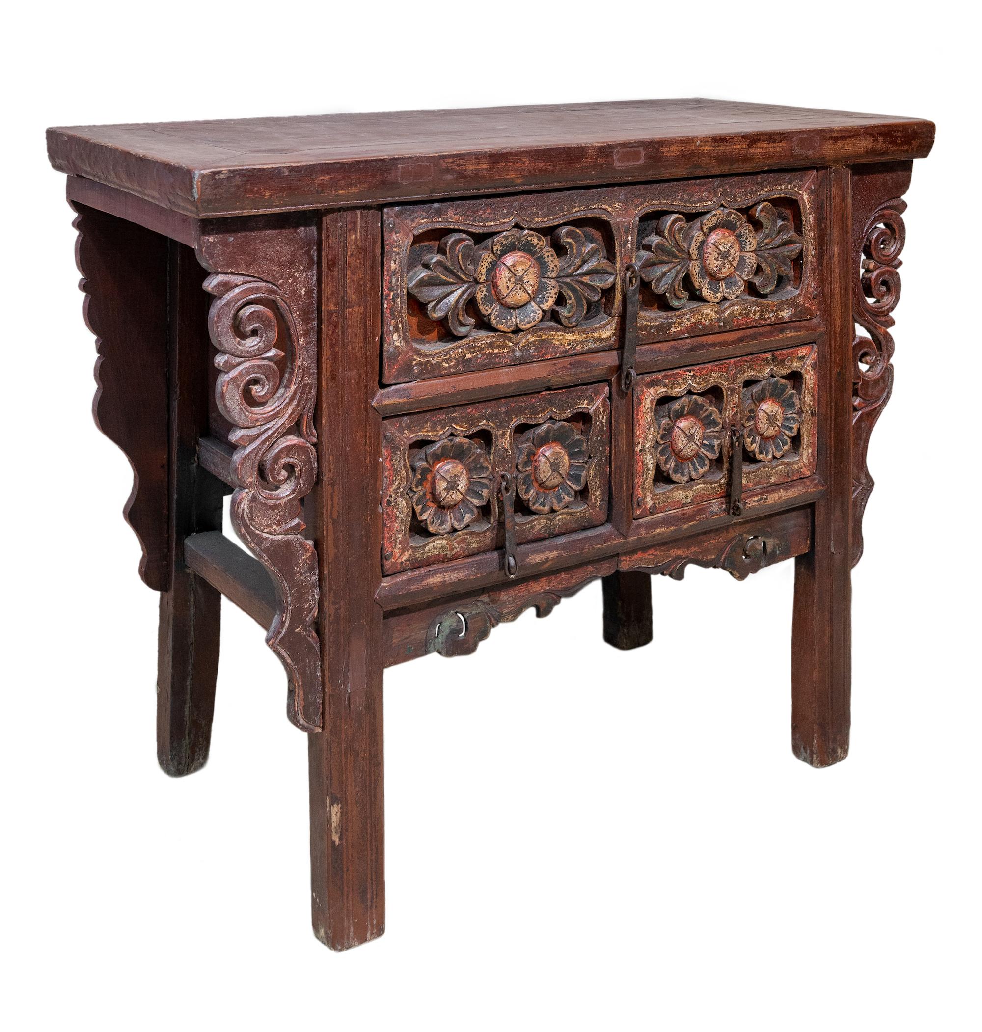 A mid-19th century coffer table from Shanxi province, China. Approximate 150-200 years old. The carvings on this table has a floral theme, with very deep chunky carvings that is a distinct style of pieces from that region. It has a nice original