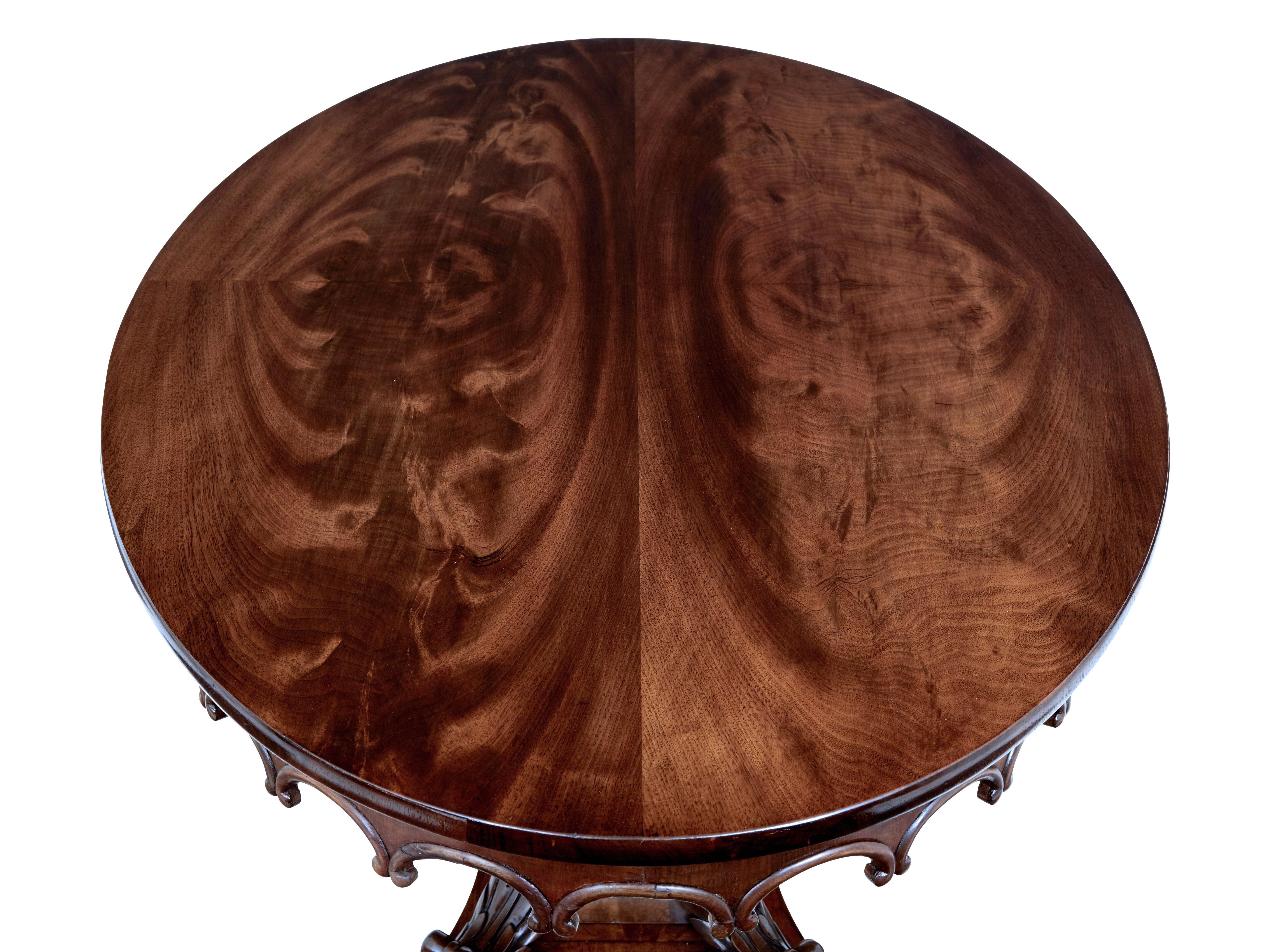 Mid 19th Century Carved Flame Mahogany Oval Center Table In Good Condition In Debenham, Suffolk