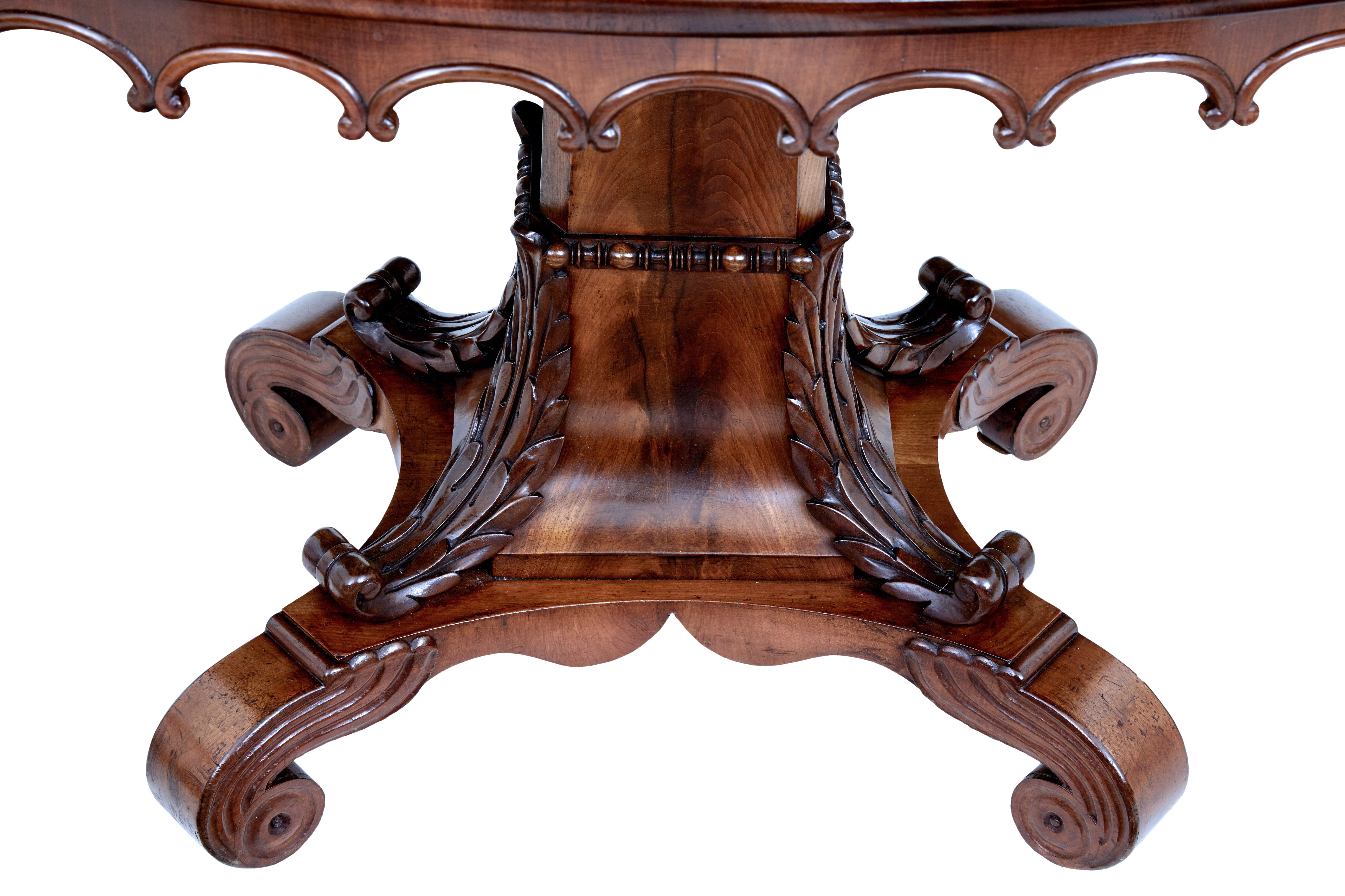 Mid 19th Century Carved Flame Mahogany Oval Center Table 1