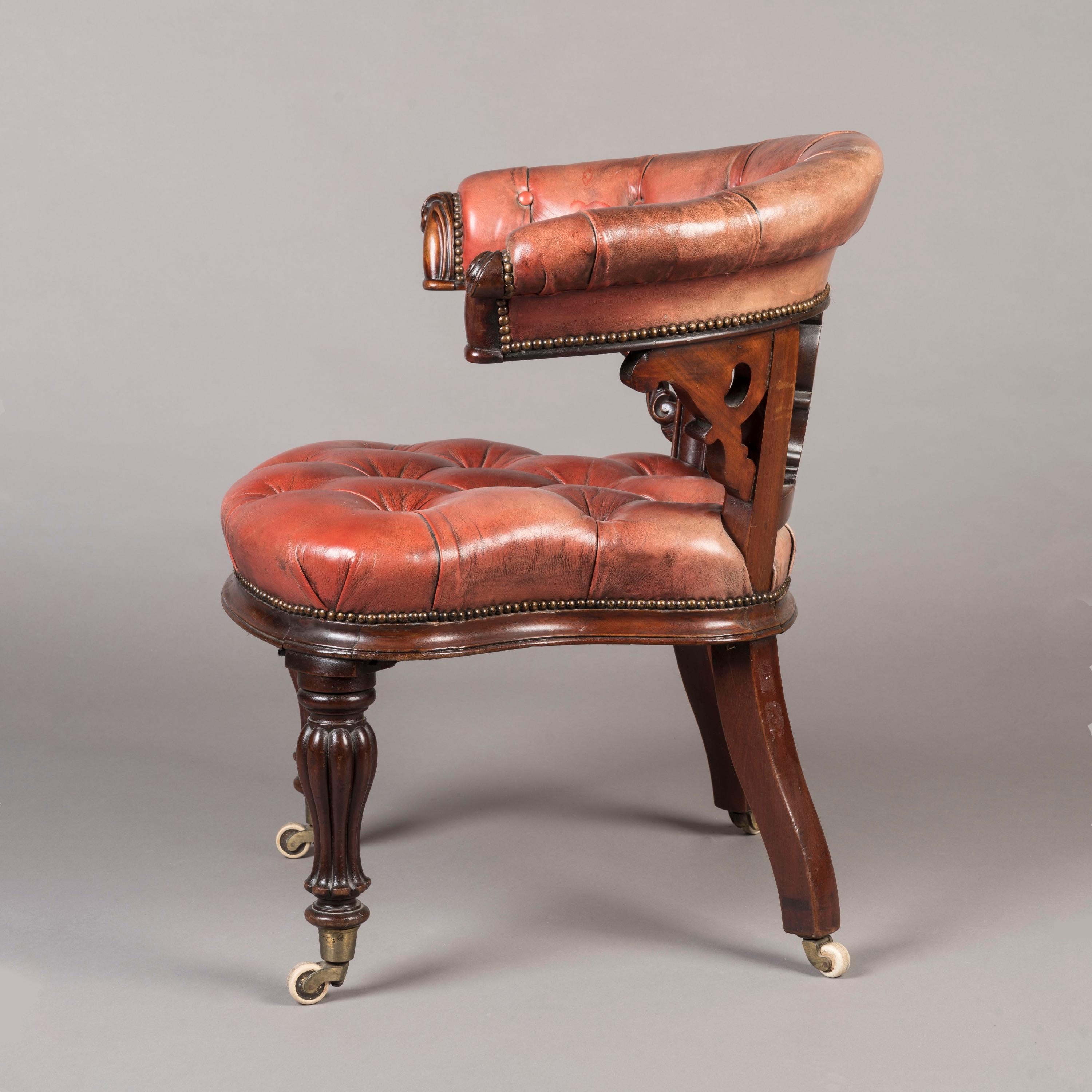 English Mid-19th Century Carved Mahogany Desk Chair with Red Leather Upholstery For Sale
