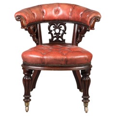 Mid-19th Century Carved Mahogany Desk Chair with Red Leather Upholstery