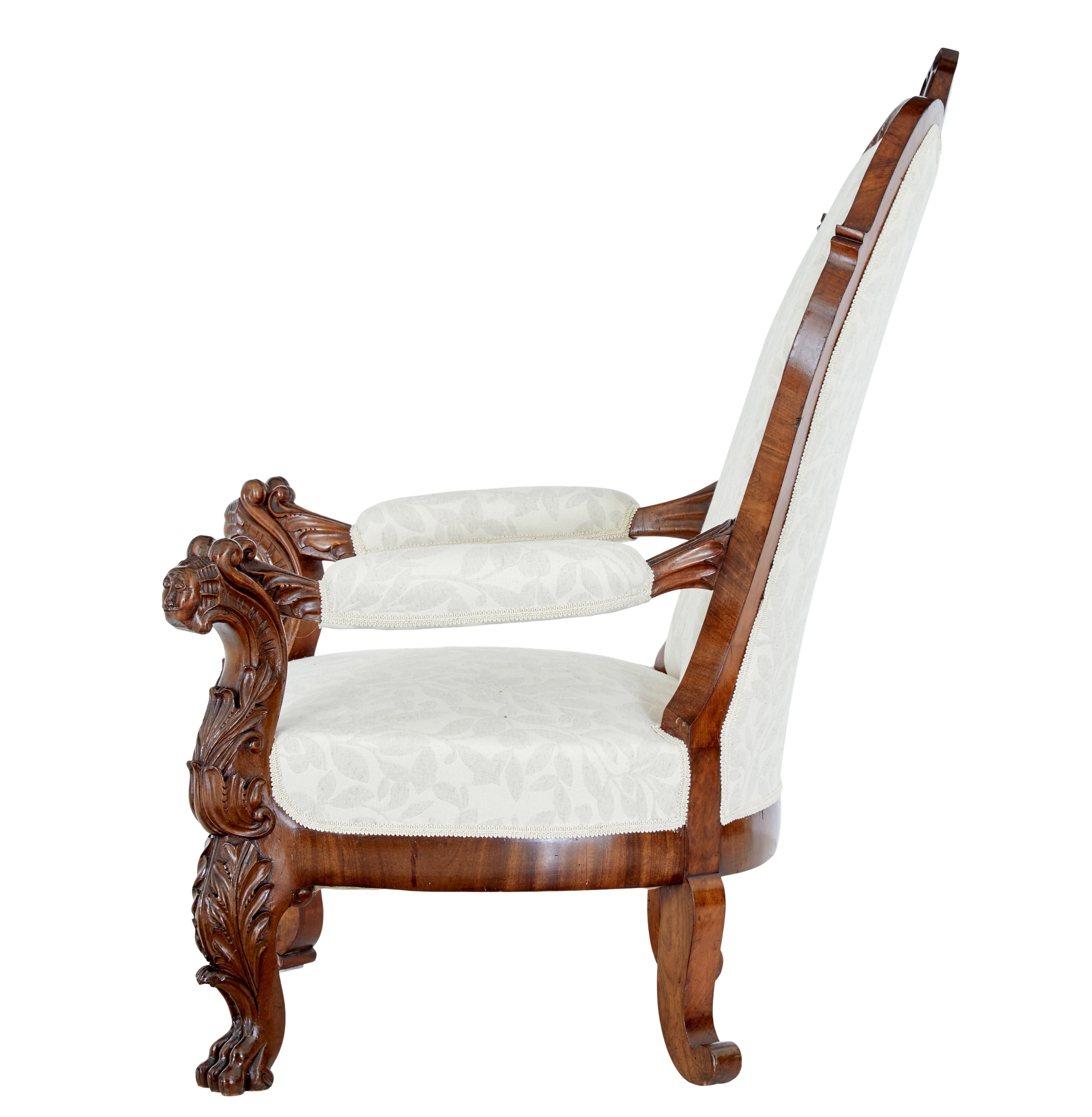 Mid 19th century carved walnut armchair circa 1860.

Fine quality profusely carved solid walnut armchair from the high victorian period.

Cartouche shaped back with carved acanthus leaves and scrolls, which lead down the the padded arms.  Arms