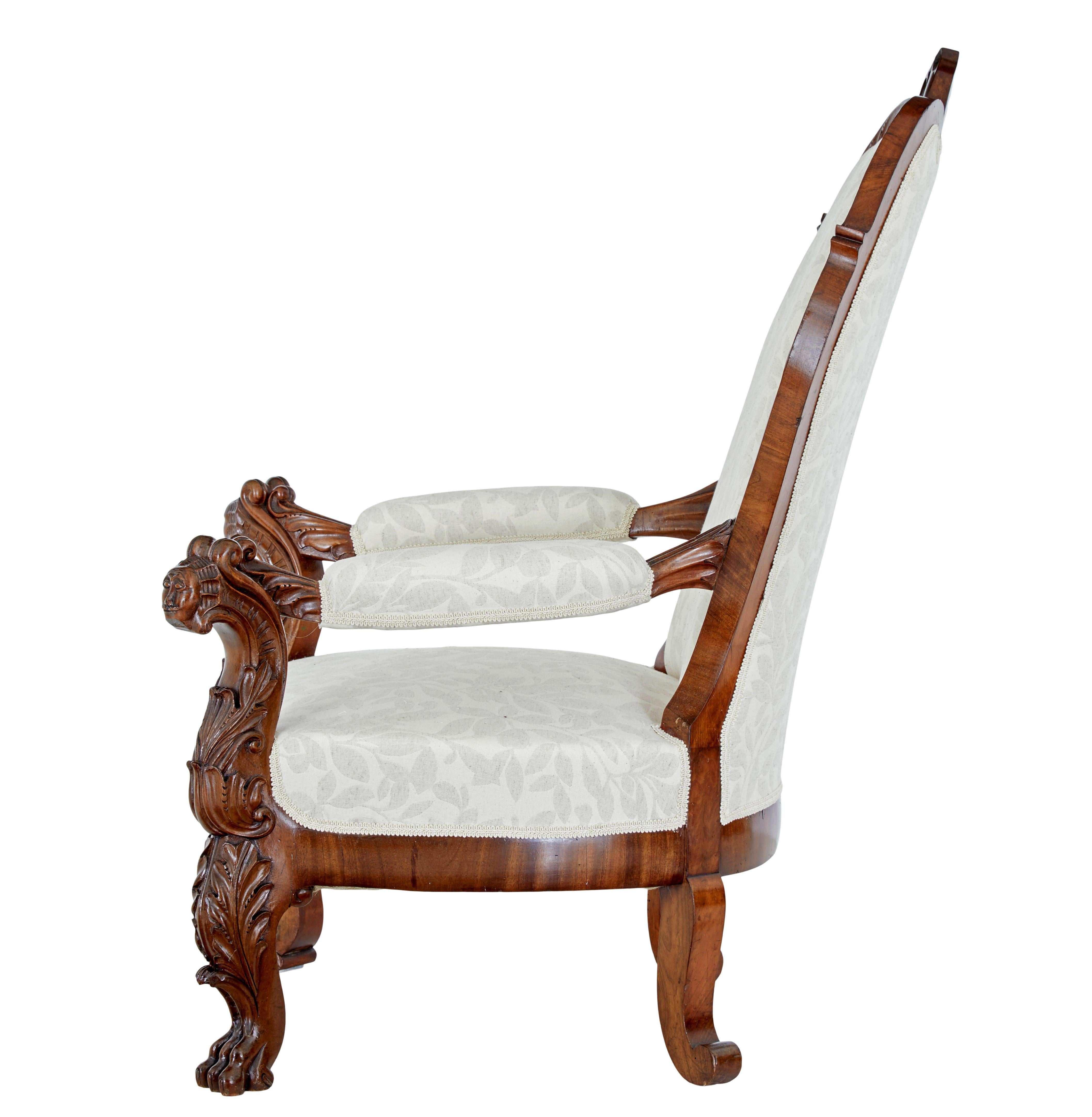 Mid 19th century carved walnut armchair circa 1860.

Fine quality profusely carved solid walnut armchair from the high victorian period.

Cartouche shaped back with carved acanthus leaves and scrolls, which lead down the the padded arms.  Arms