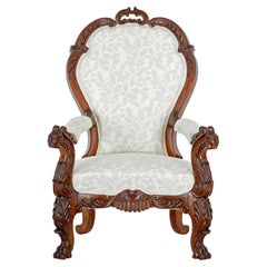 Mid 19th century carved walnut armchair