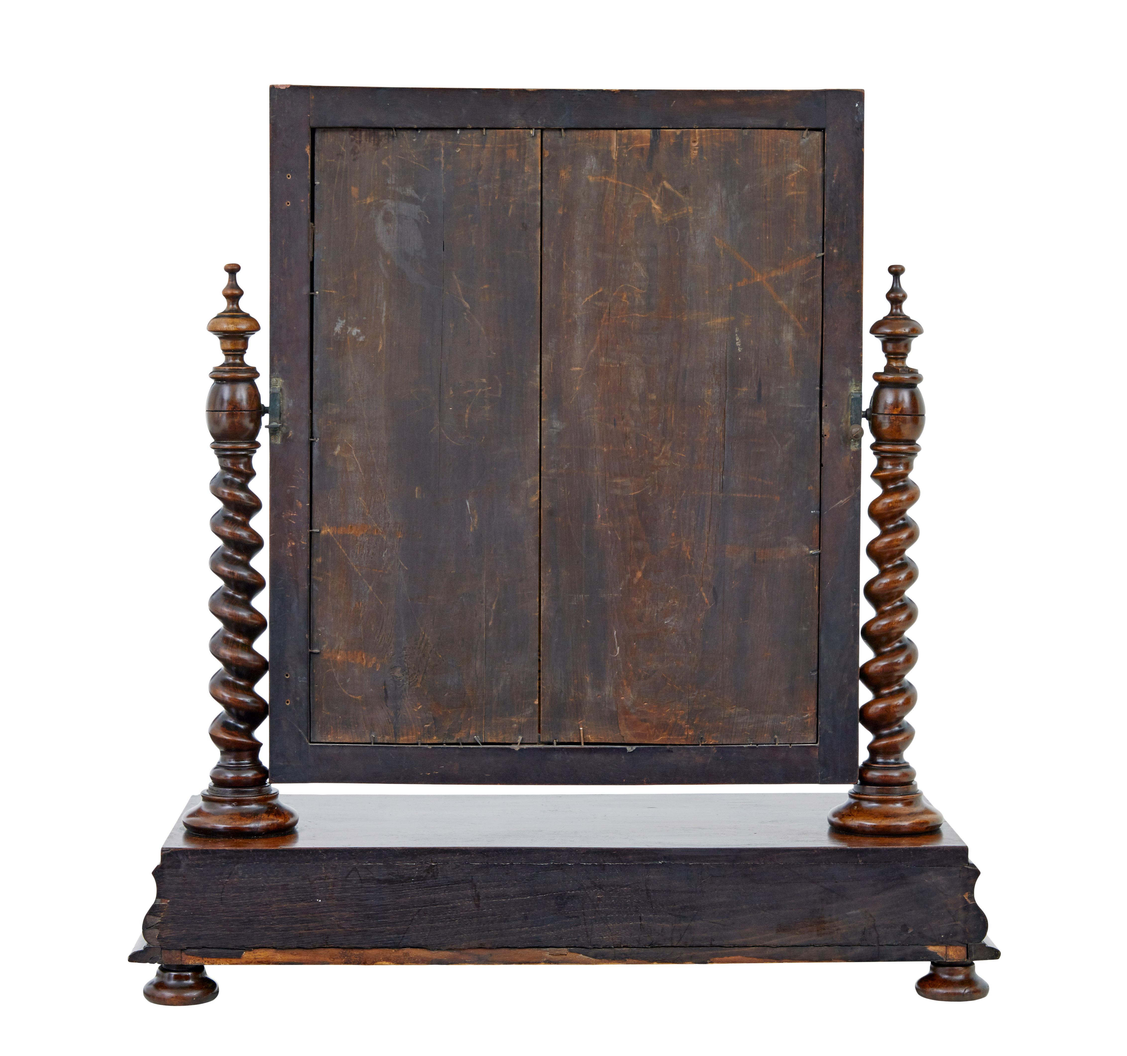 Carved Mid 19th century carved walnut toilet mirror
