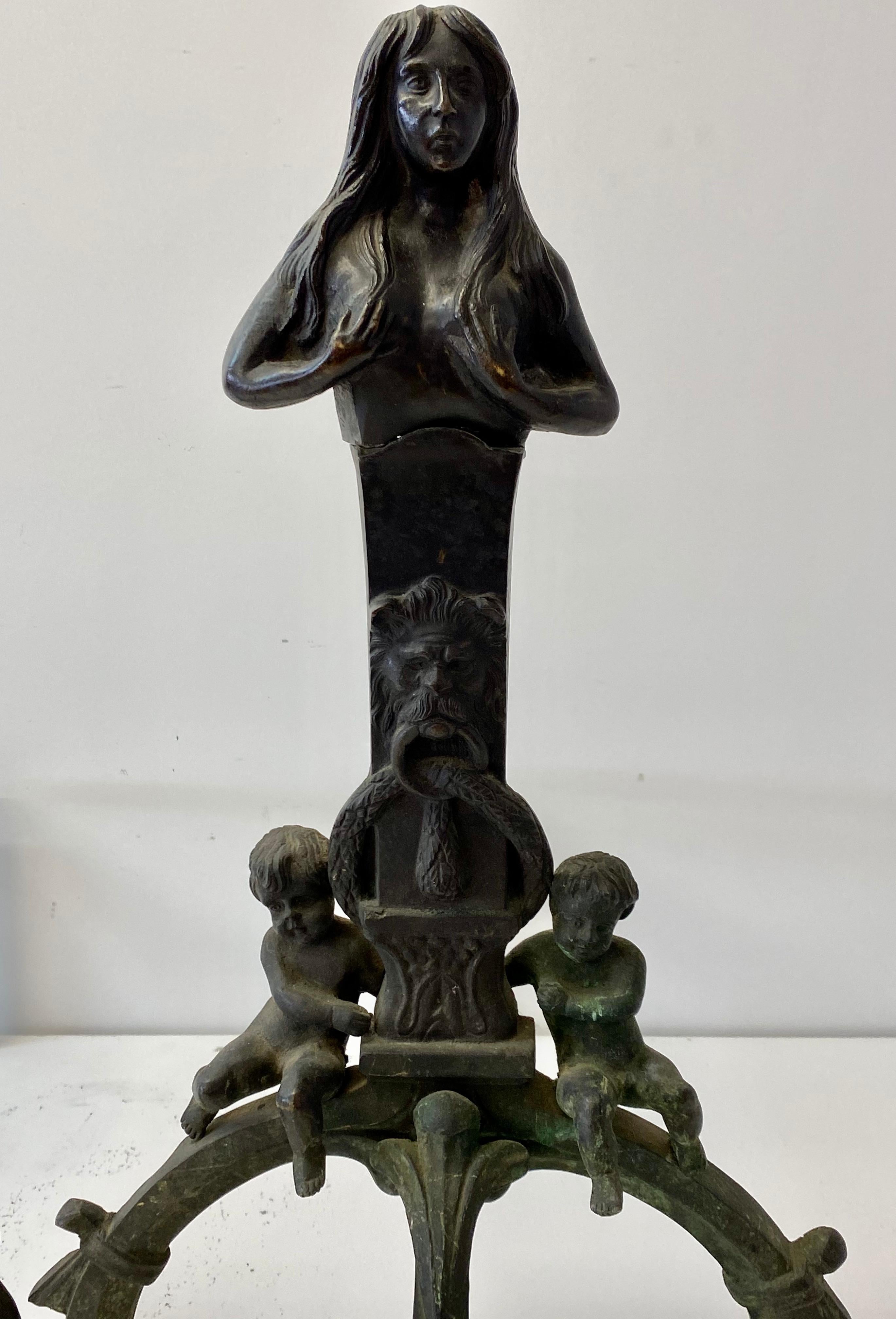 Mid 19th Century Cast Iron Figural Nude, Cherub and Lions Head Andirons In Good Condition For Sale In San Francisco, CA