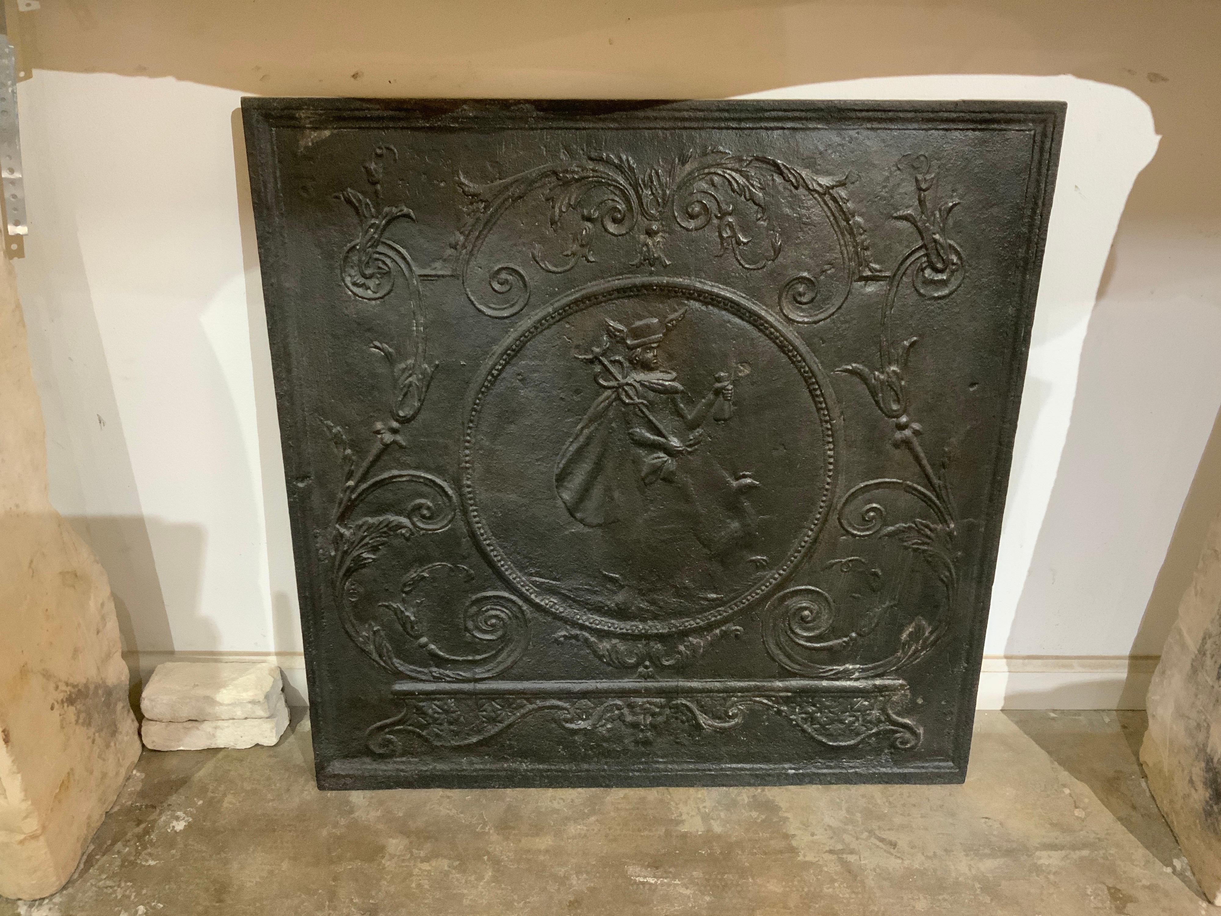 This cast iron fireback origins from France, circa 1860.