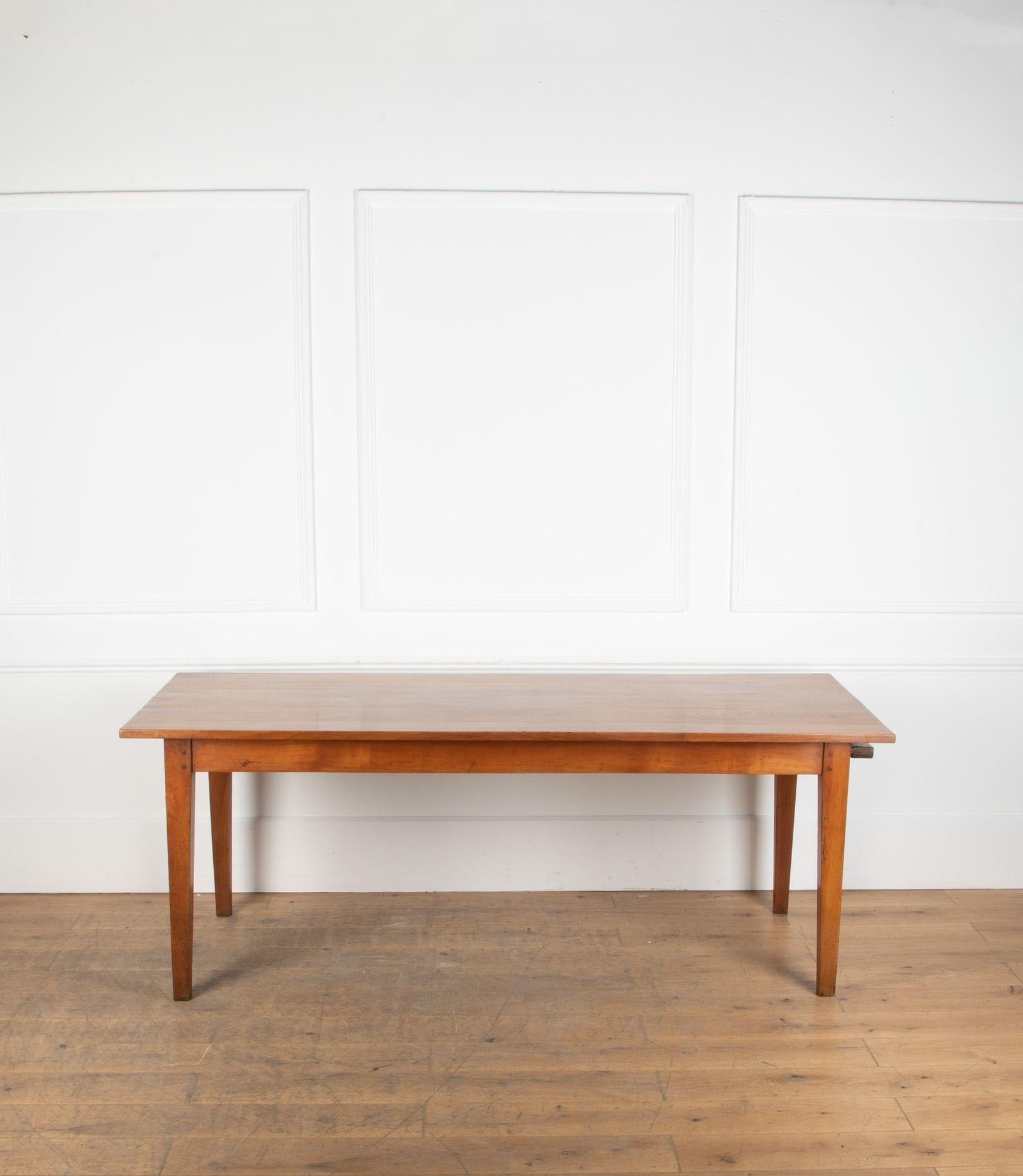 Great example of mid 19th Century cherrywood French farmhouse table.
Circa 1860s from the Normandy area of France with great colour and patina. With a bread slide to one end. Will seat 6-8 people.