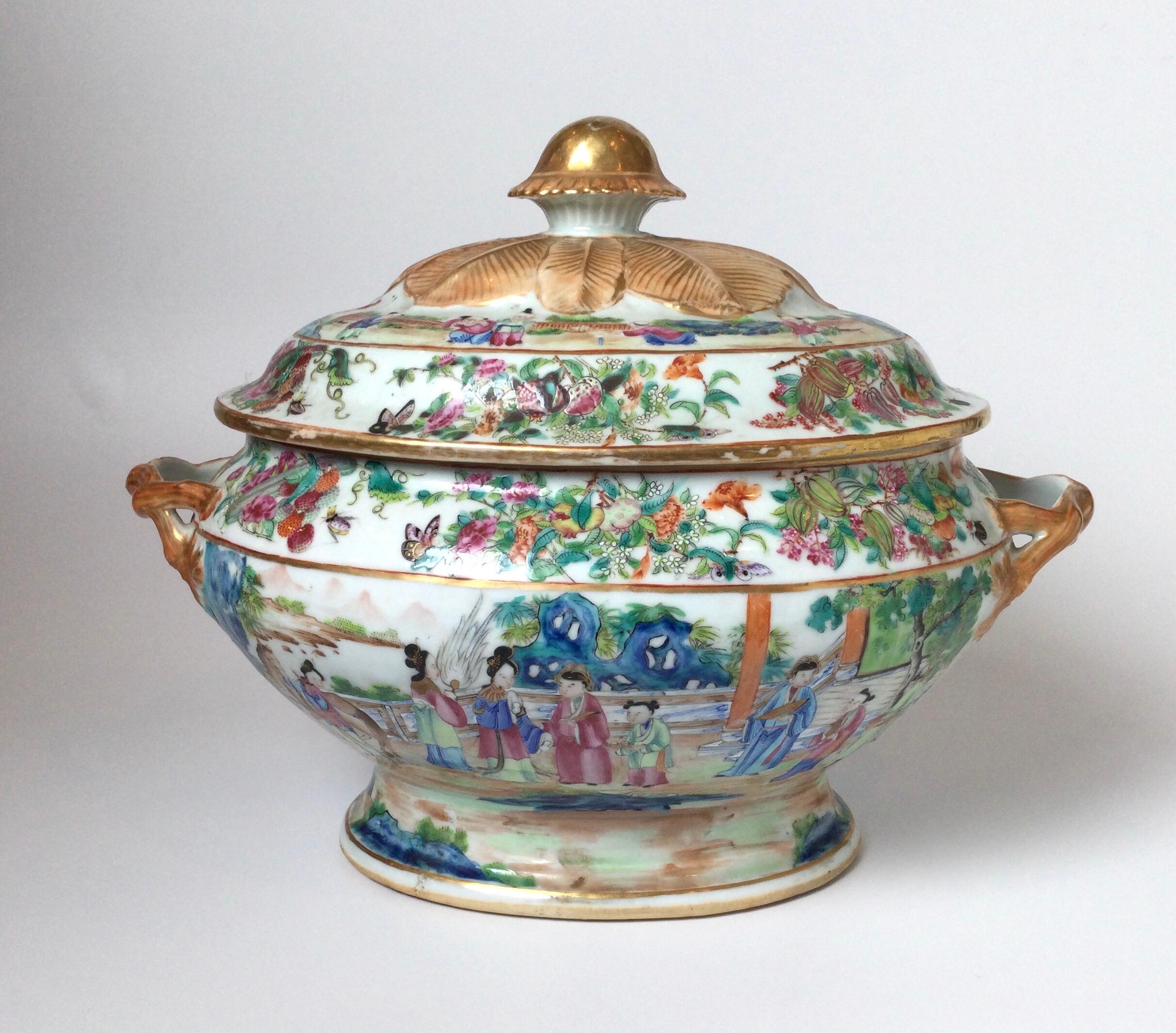 A large rose Mandarin Chinese tureen with lid. The delicate painting all around which is classic fine chines porcelain from the mid 19th century. The lid with a beautifully gilt handle with a burst of hand gilt decoration. The gilt handles in a twig