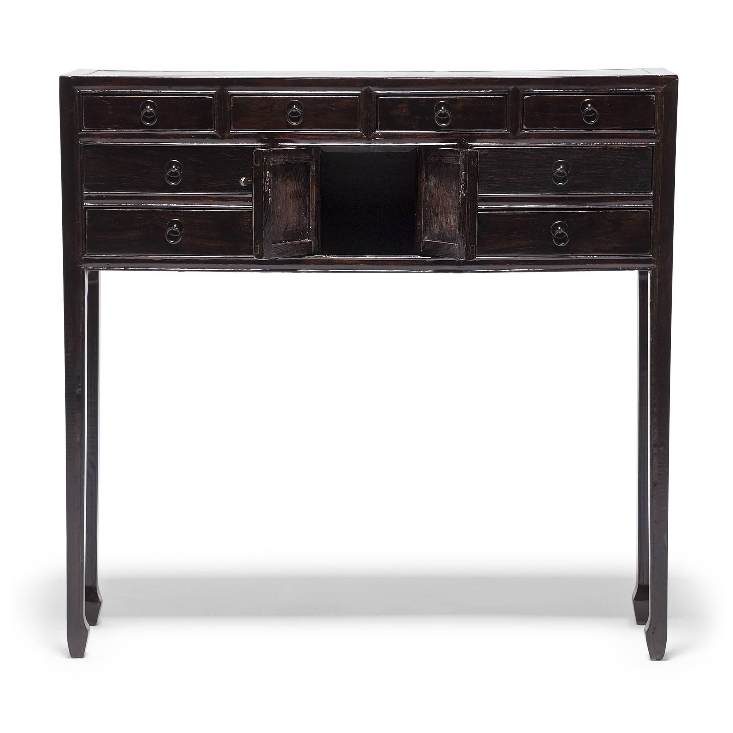 This 19th century altar coffer keeps with the style of Ming-dynasty furniture through its clean lines and minimal ornamentation. Originally used beside a kang platform bed in a woman's sleeping quarters, our carpenters, skilled in traditional