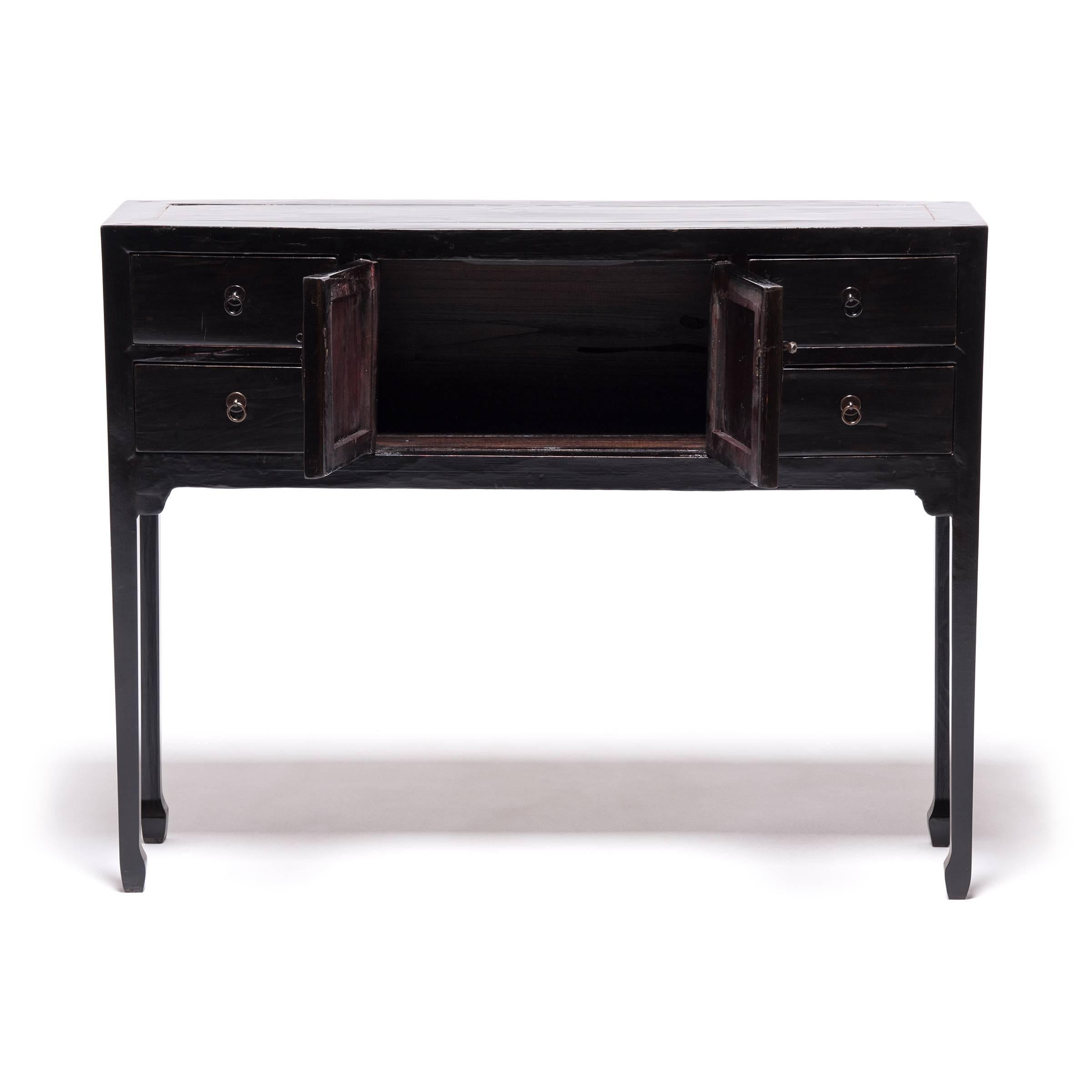 This 19th century altar coffer keeps with the style of Ming-dynasty furniture through its clean lines and minimal ornamentation. Originally used beside a kang platform bed in a woman's sleeping quarters, our carpenters - skilled in traditional