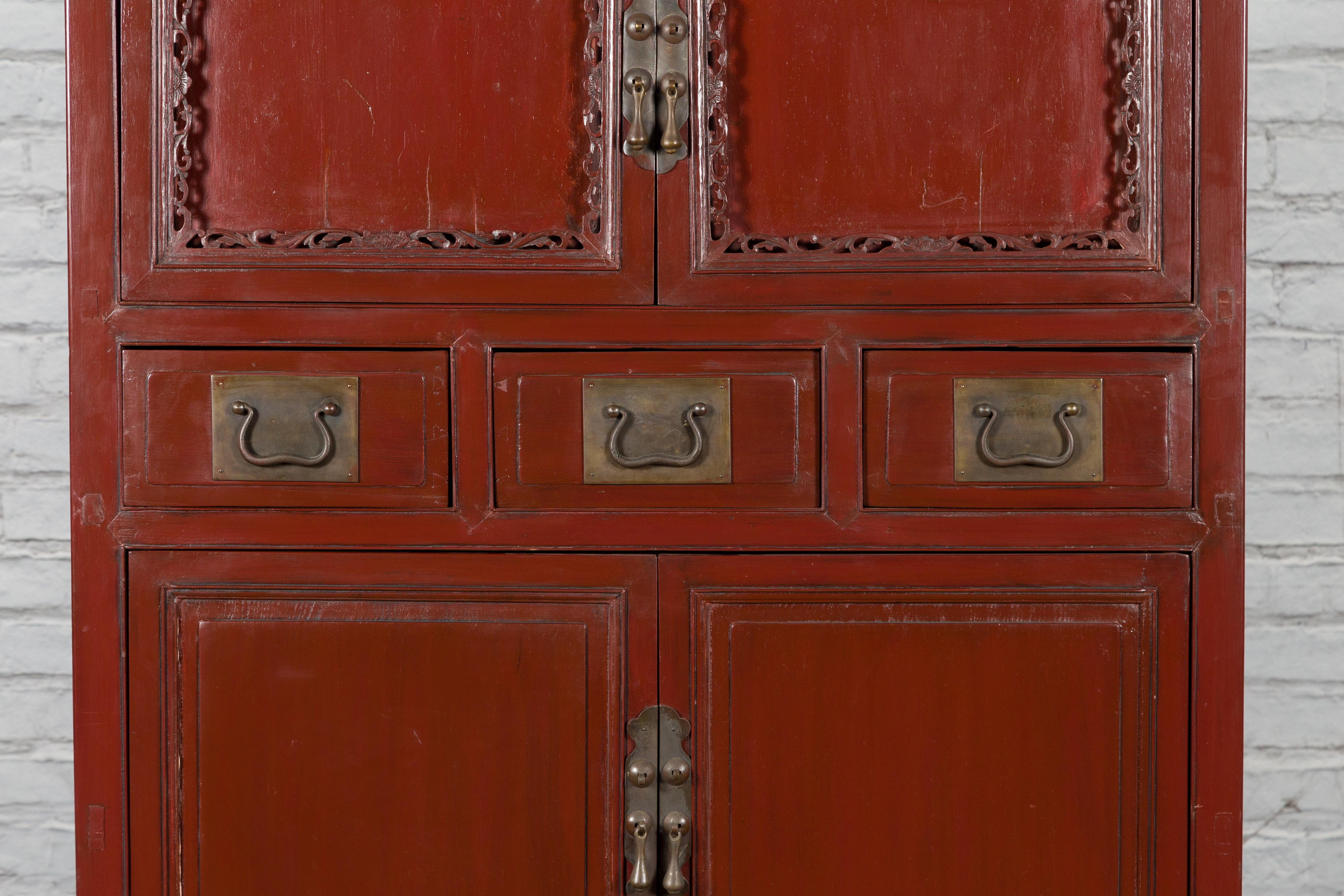 Bronze Mid-19th Century Chinese Qing Red Lacquer Cabinet with Multiple Carved Doors For Sale